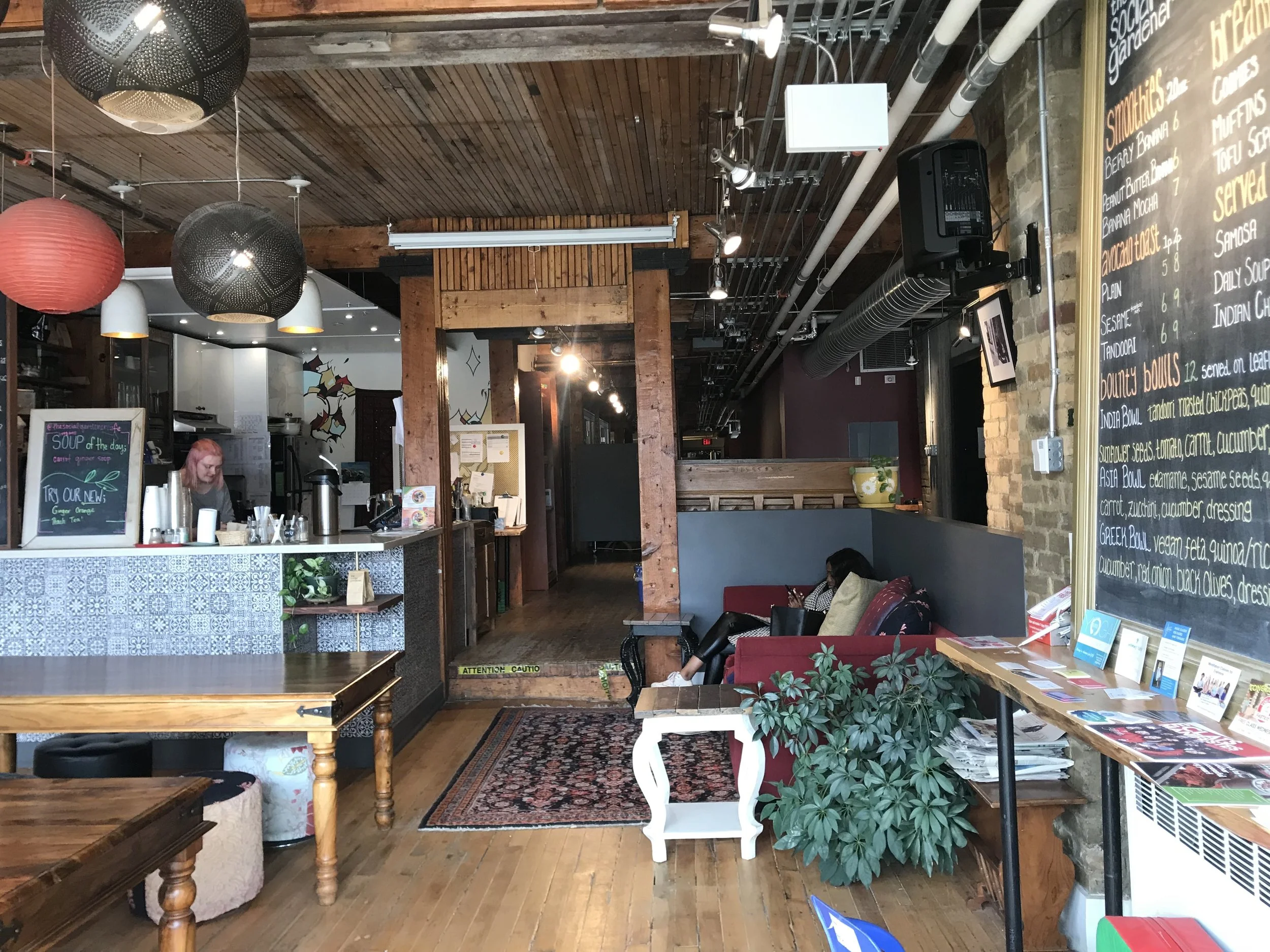 Picture of the service counter and seating area of the social gardener cafe