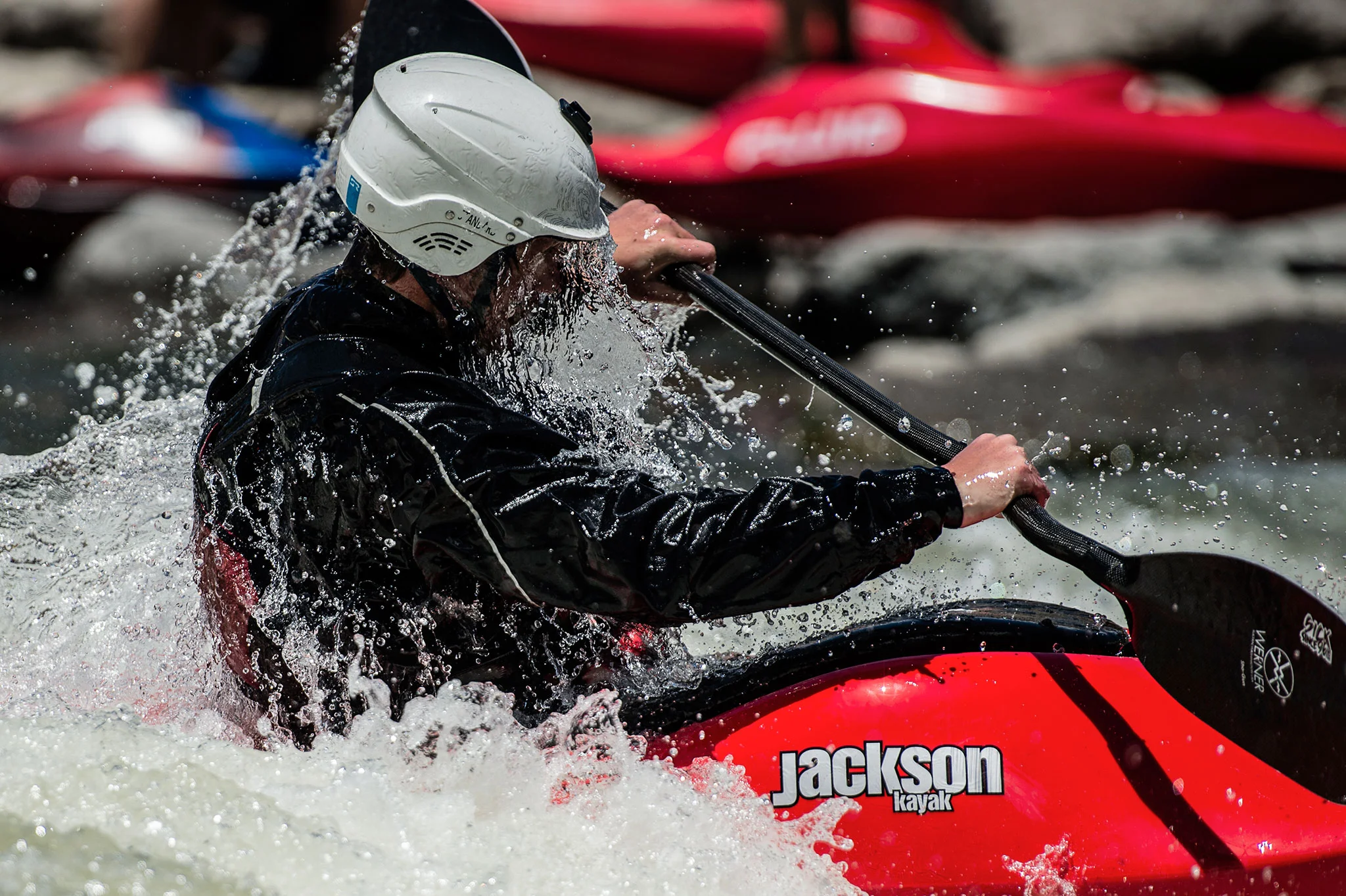 A kayaker emerges from under the water in the San Juan river in southern Colorado