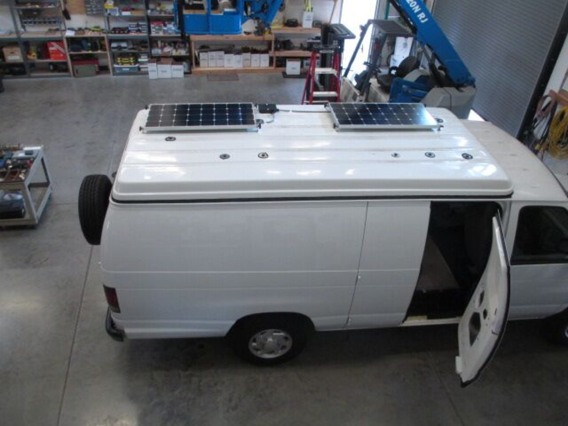 Equipment Added: 2x SF180 Solar Panel Kits 1x Roof Combiner Box 1x SunRunner Signature MPPT 40A Charge Controller Core 1x Magnum MS2000 Inverter