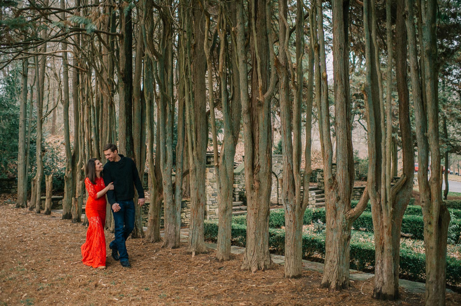 Woman in red dress by tree line at Hidden Valley Farm