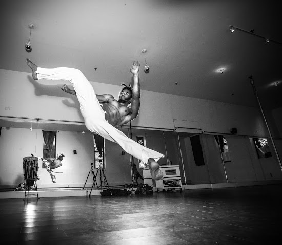 Instructor Pena Verde demonstrating a Capoeira kick called an Armada Martelo at Sacred Studio in BedStuy, Brooklyn, where he teaches class (all levels) on Tuesdays at 6:00pm and Saturdays at 2pm. (Photo by Ace Murray / Brooklyn Juice Photography.)
