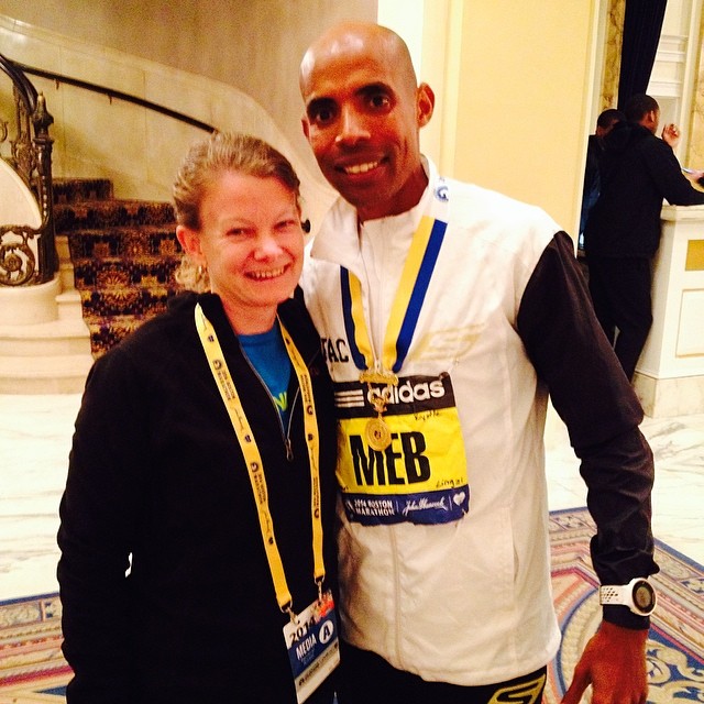 Perks of the press room? You get to greet the newly minted Boston Marathon champion—in 2014 it was Meb Keflezighi.