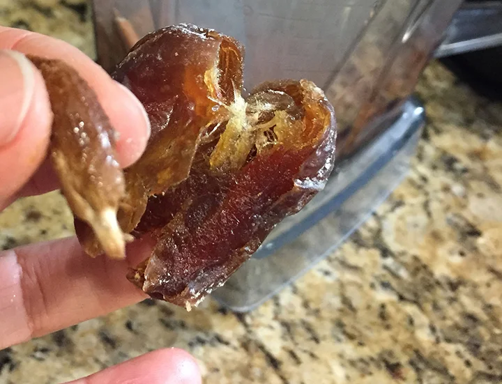 Don't forget to pit your dates or your blender will remind you that you didn't. Just squish them between your fingers and the pit will pop out. 