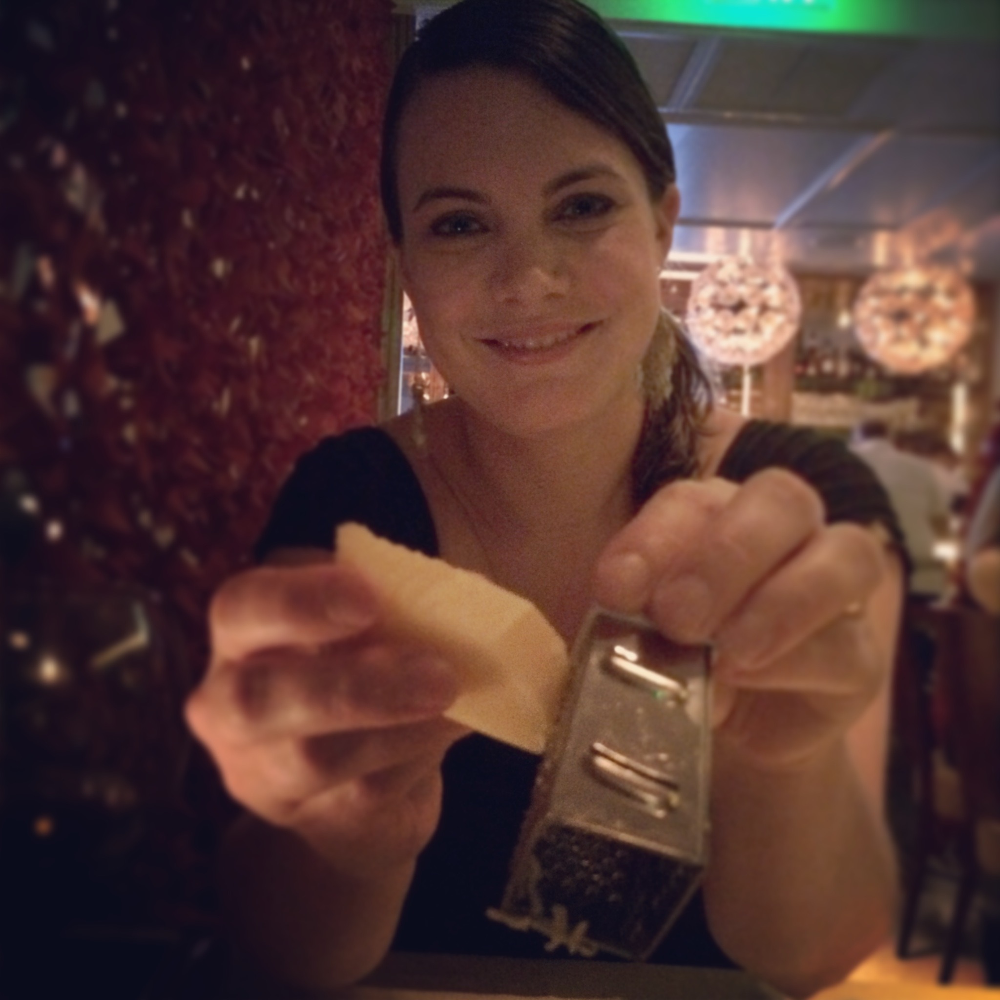 Me, using the "mini" cheese grater. 