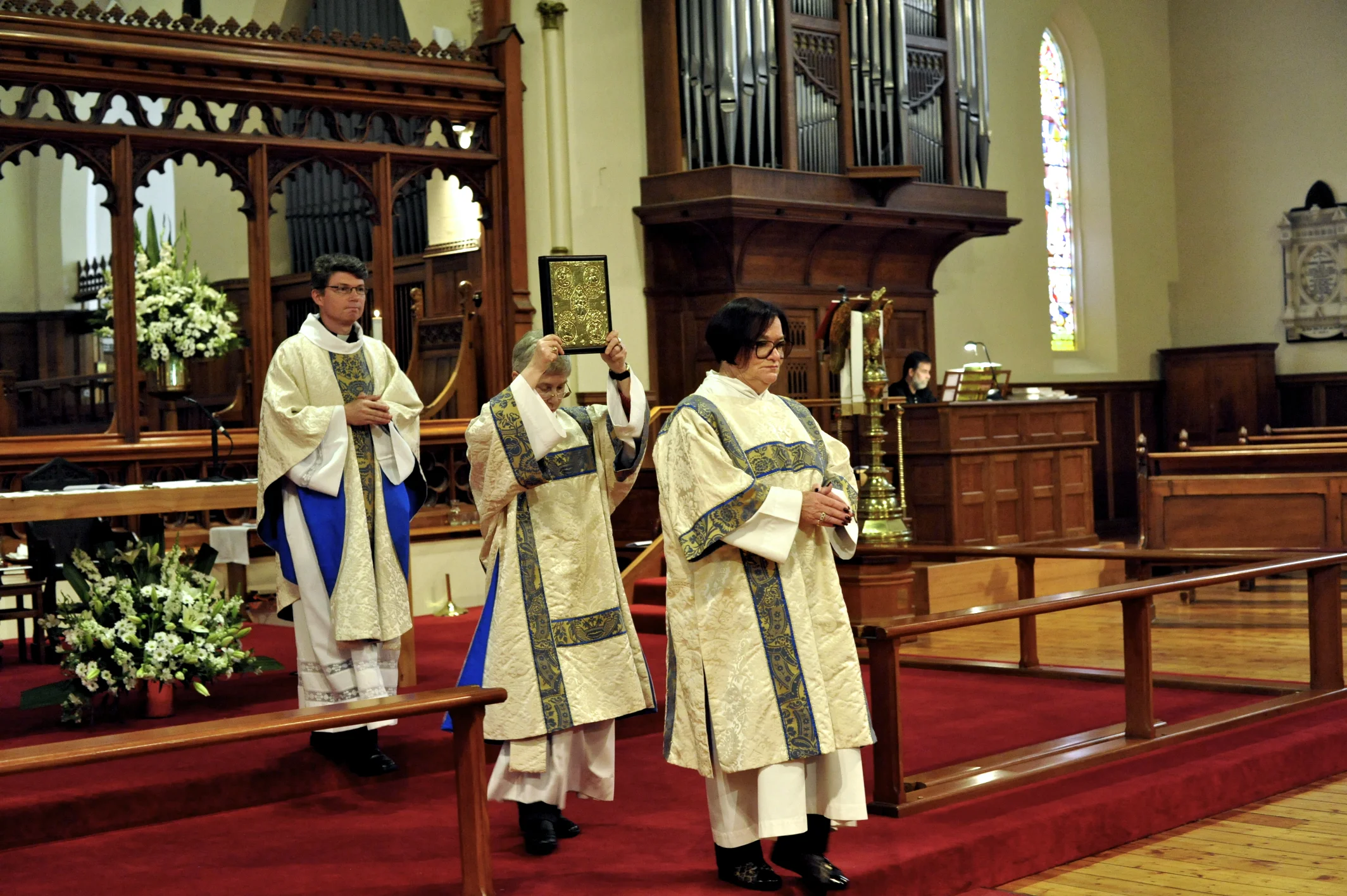 The Sacred Ministers processing out