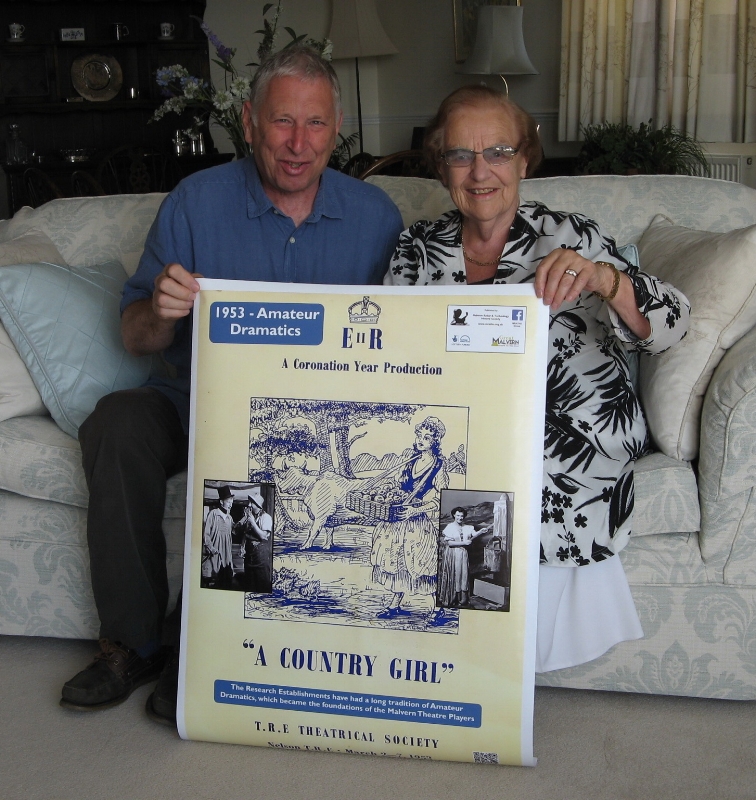 Mike Burstow and Heather Judson holding a copy of the poster she spotted herself in. Copyright MRATHS
