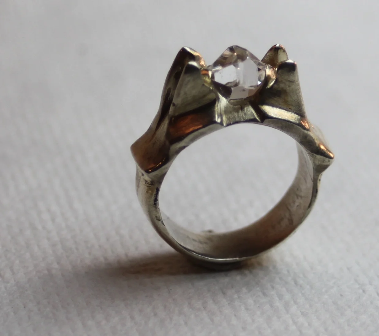 Quartz "Herkimer Diamond" from upstate New York set in a casted sterling silver ring. Sold.