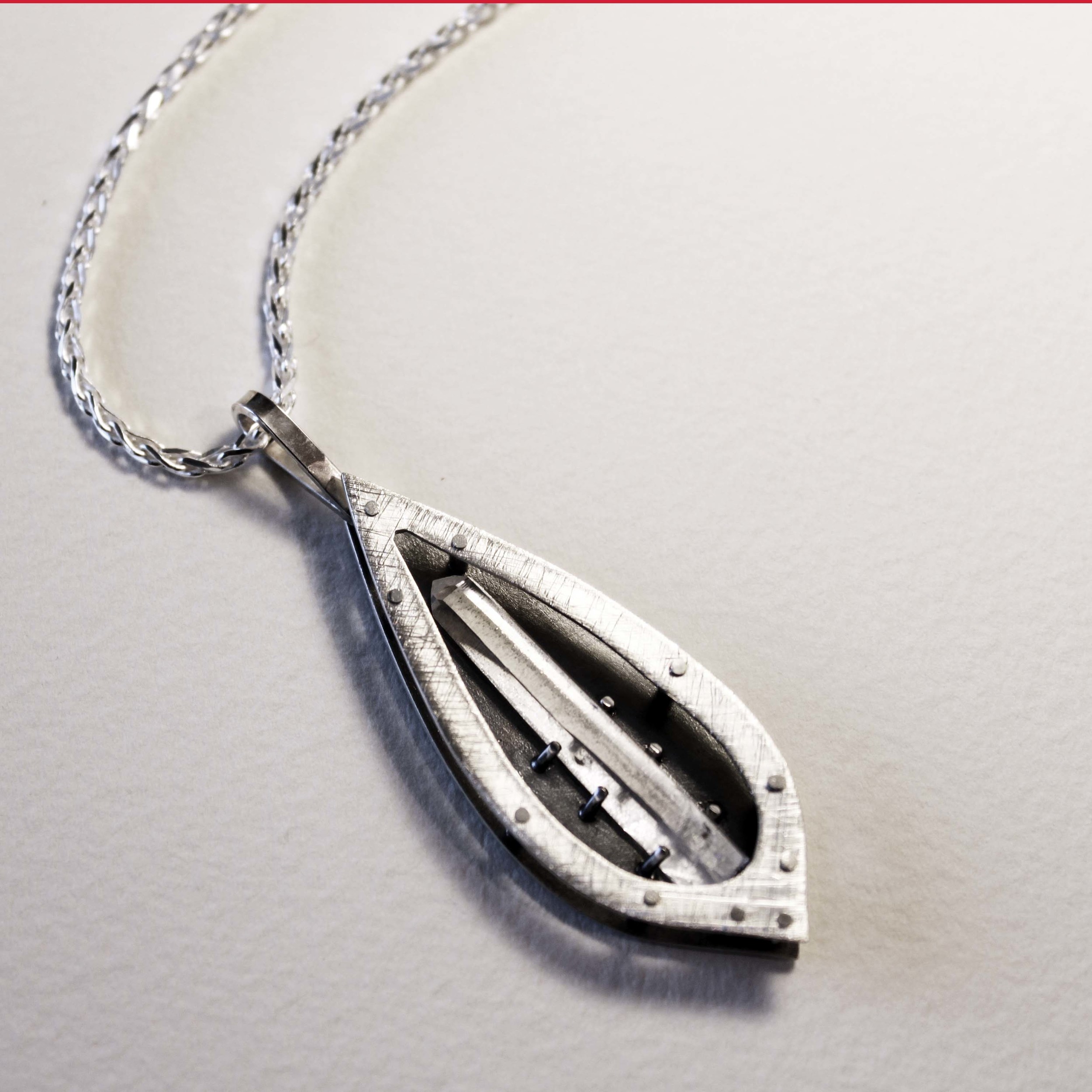 Quartz crystal from Spruce Ridge, Washington. Set in textured sterling silver.
