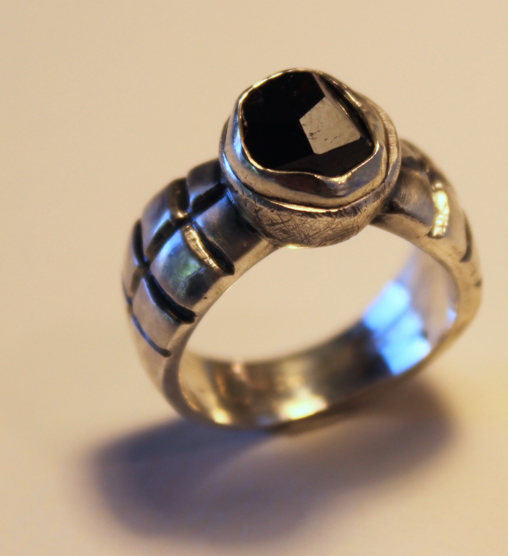 Garnet crystal from Garnet Hill, Ely, Nevada. Set in casted sterling silver.