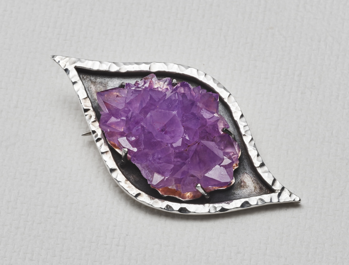 Amethyst cluster from the Blue Point Mine, Pearl, Ontario, Canada. Set in a fabricated brooch.
