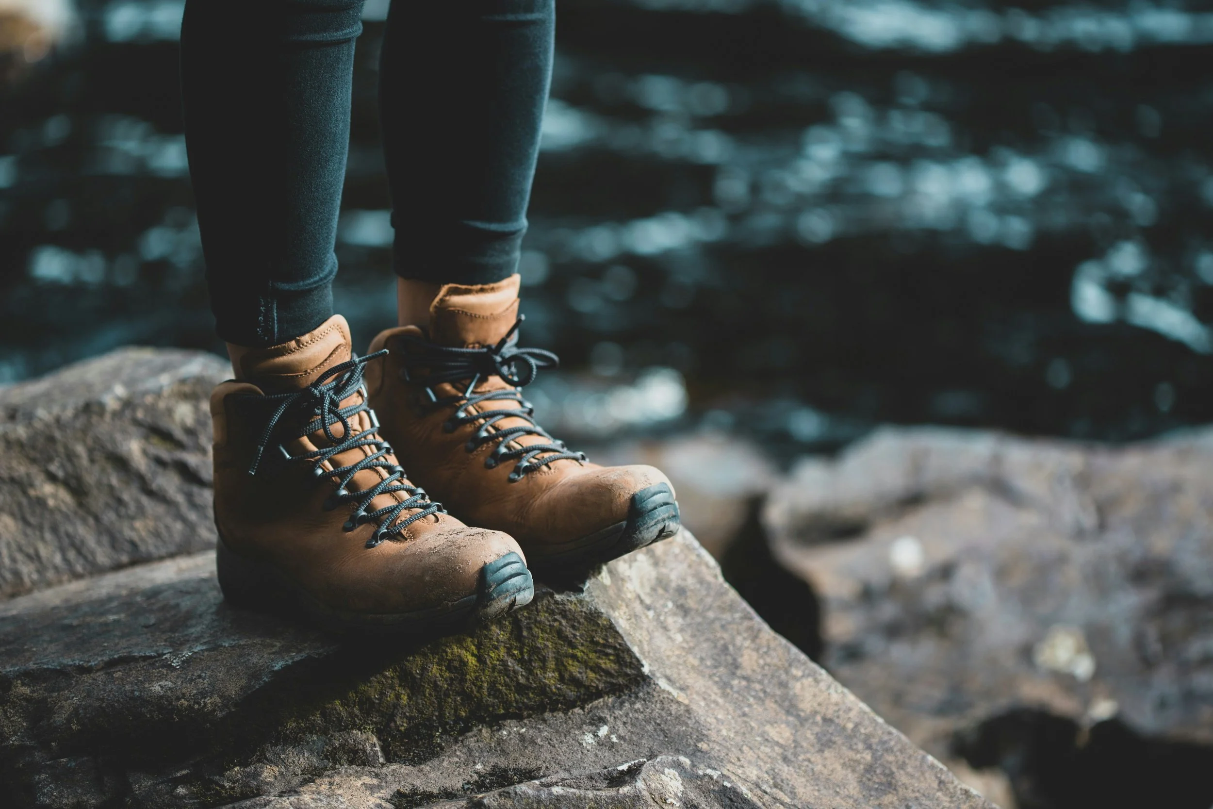 Hiking boots stood on a rock