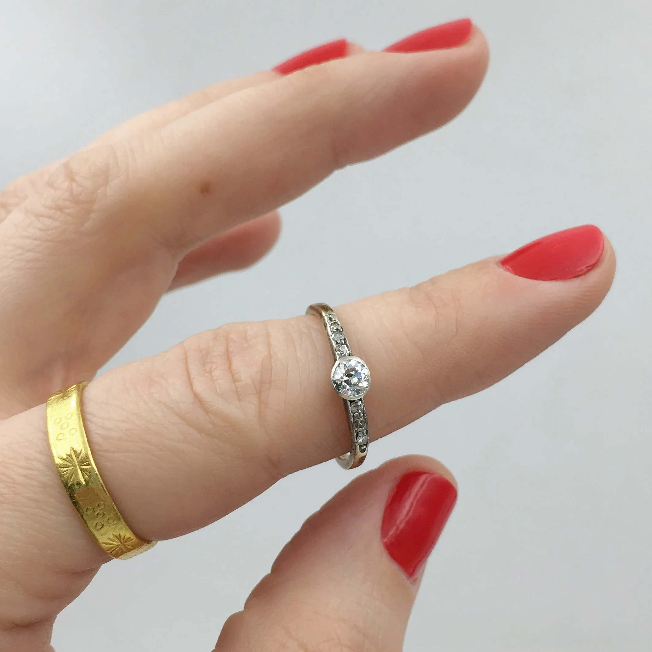 Old mine cut diamond solitaire engagement ring Reverie vintage jewelry NYC