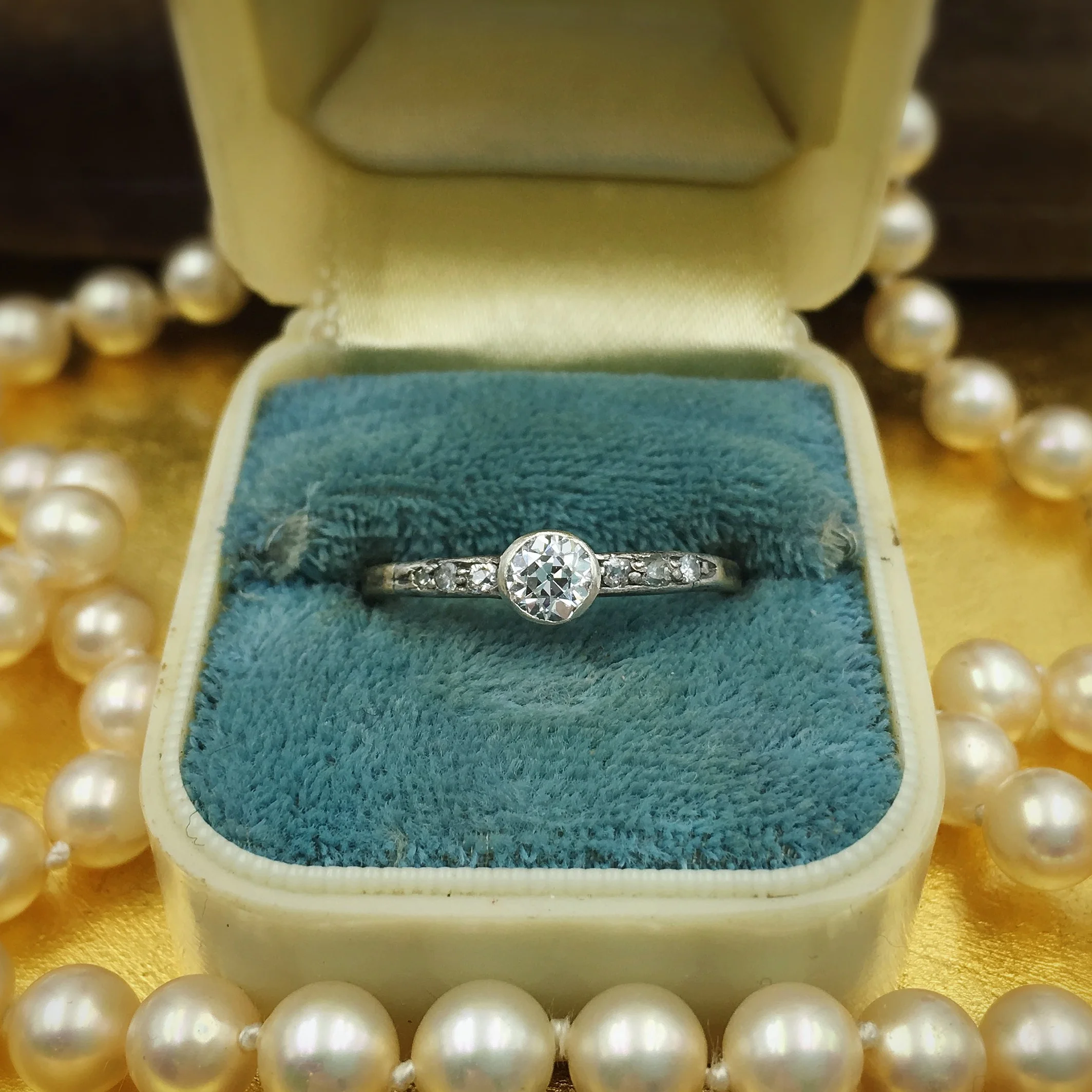 Old mine cut diamond solitaire engagement ring Reverie vintage jewelry NYC