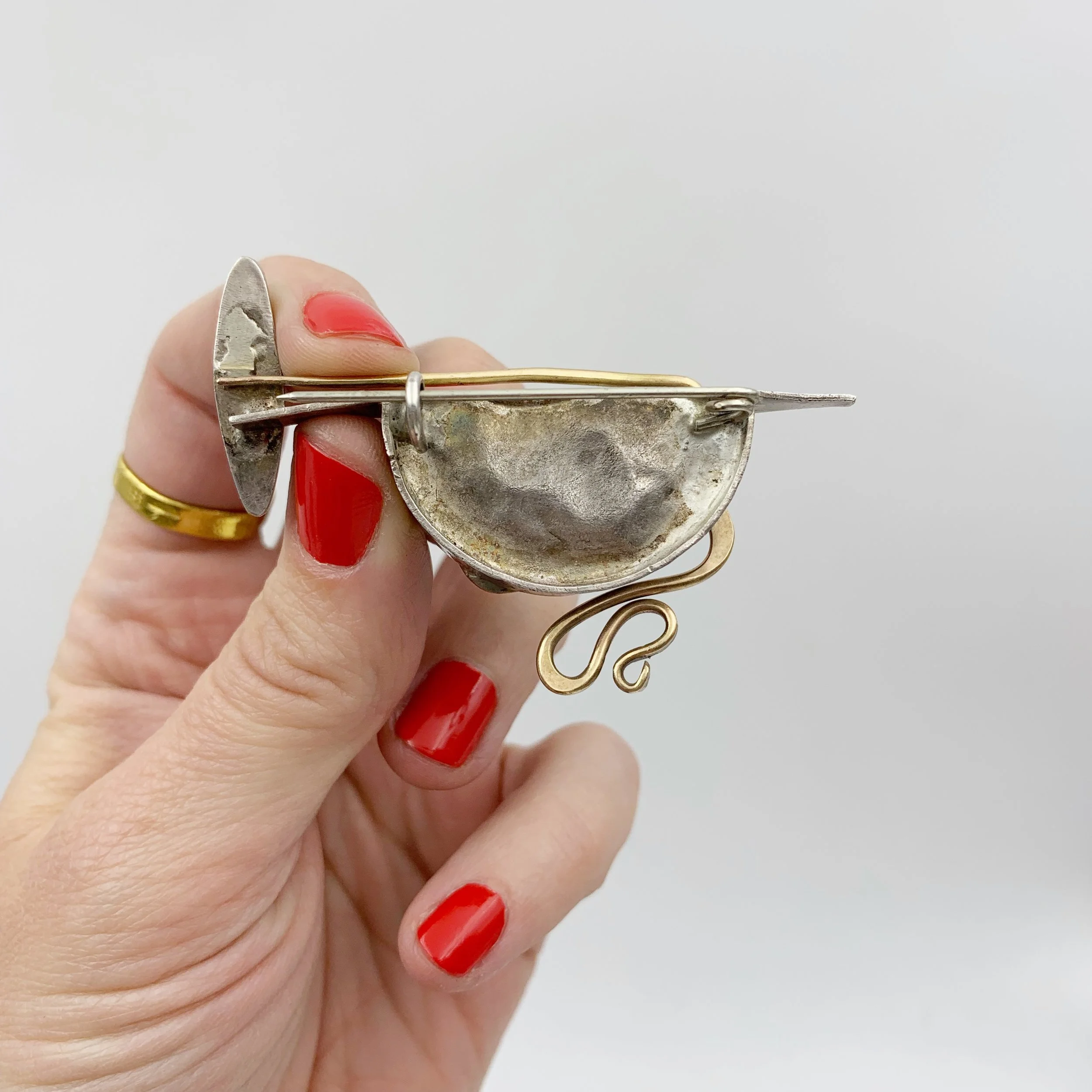 Modernist gold and silver brooch Reverie vintage mid century jewelry NYC