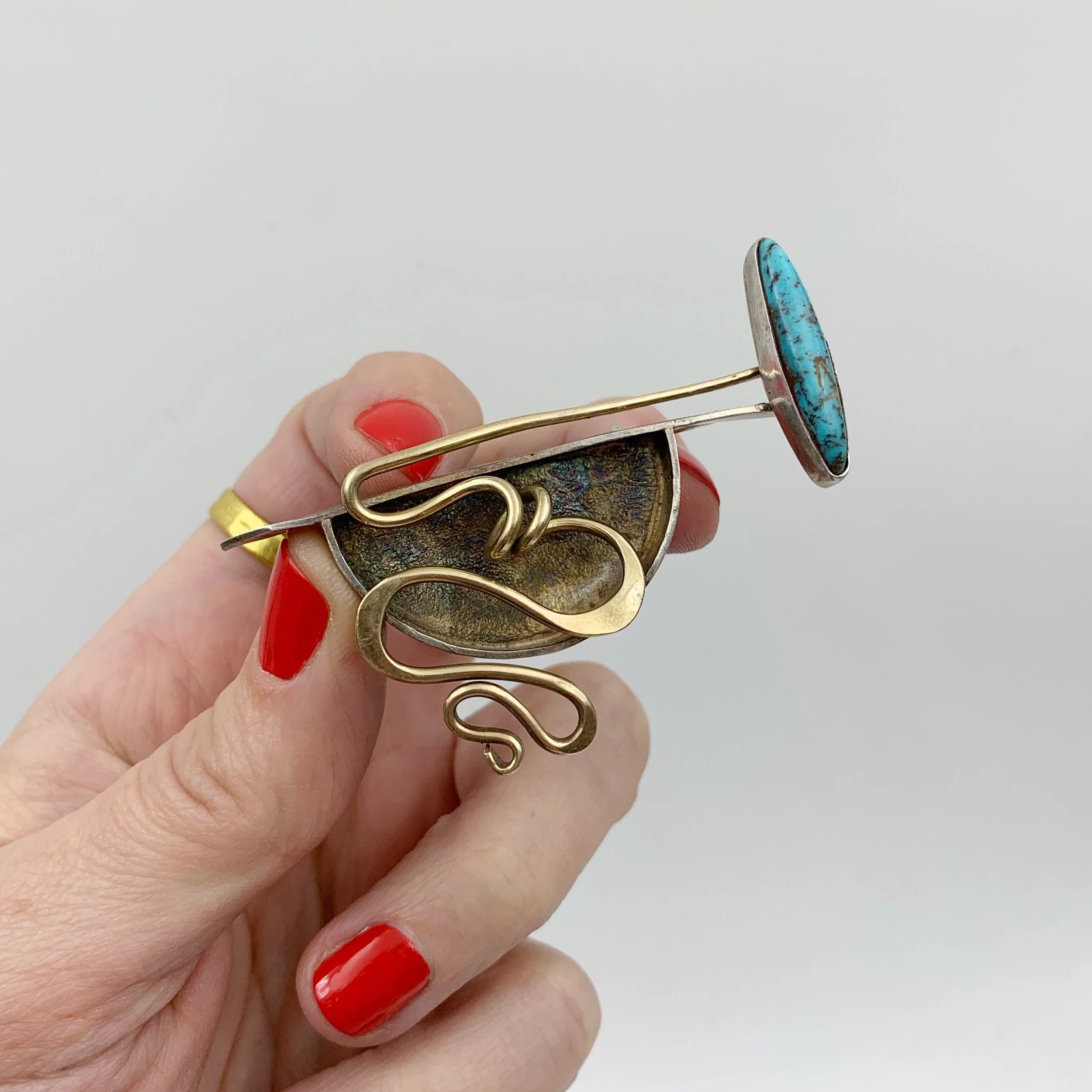 Modernist gold and silver brooch Reverie vintage mid century jewelry NYC