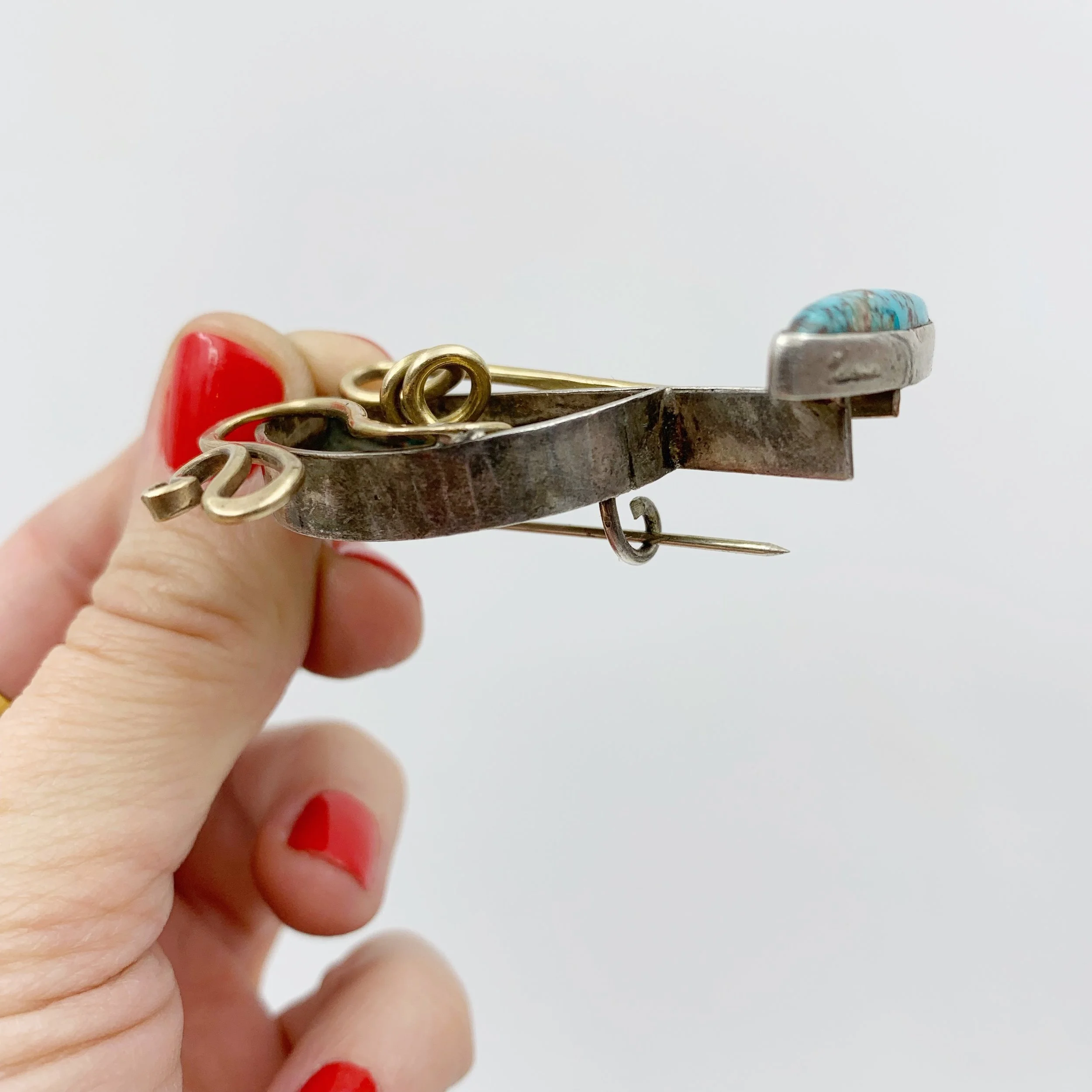 Modernist gold and silver brooch Reverie vintage mid century jewelry NYC