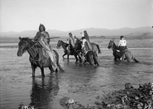 Horsemen_crossing_the_Los_Pinos_River.jpg