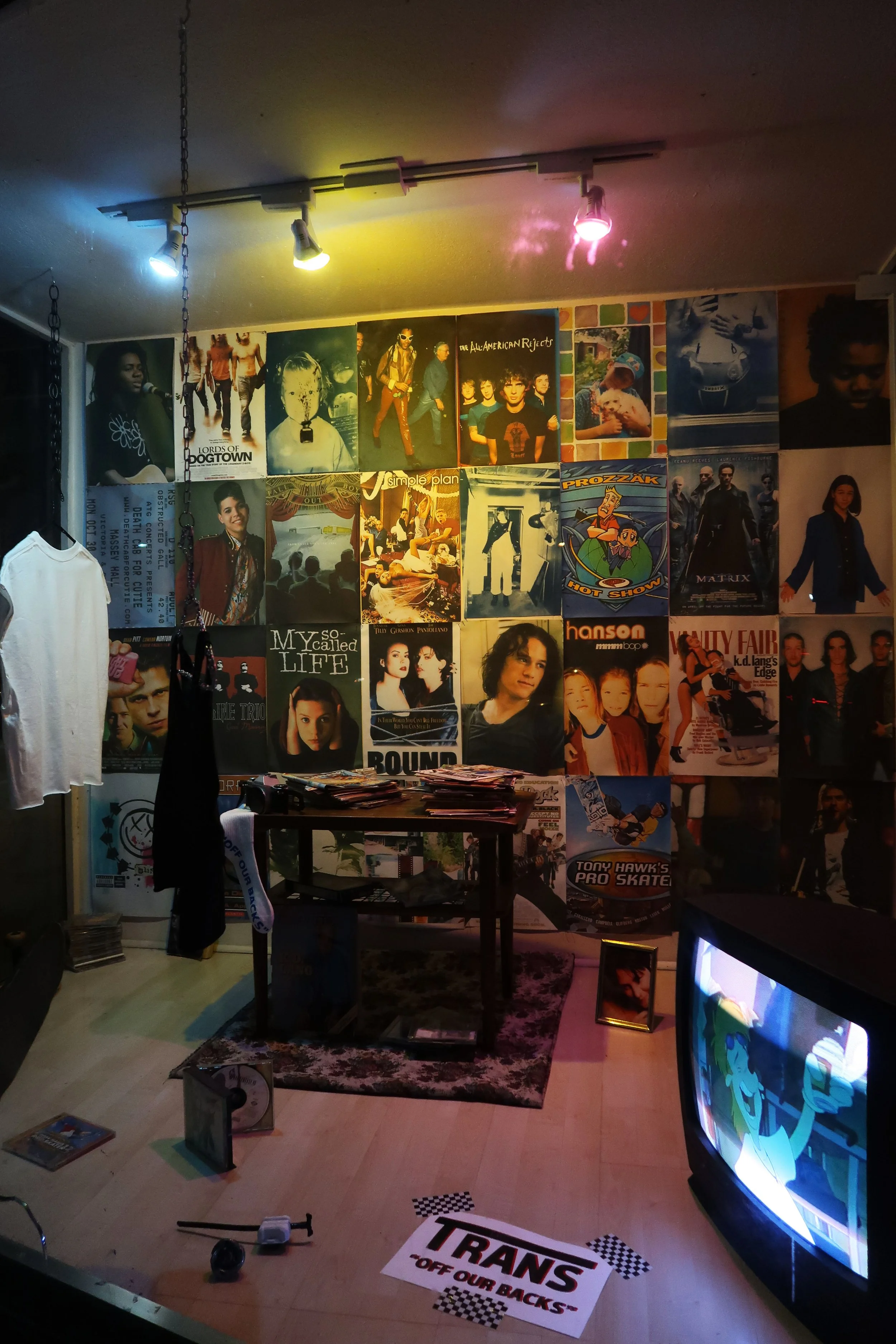  Wheatpasted Xerox print wall, Compilation Video Work on DVD, Screenprint on Socks, Various Found Objects. 