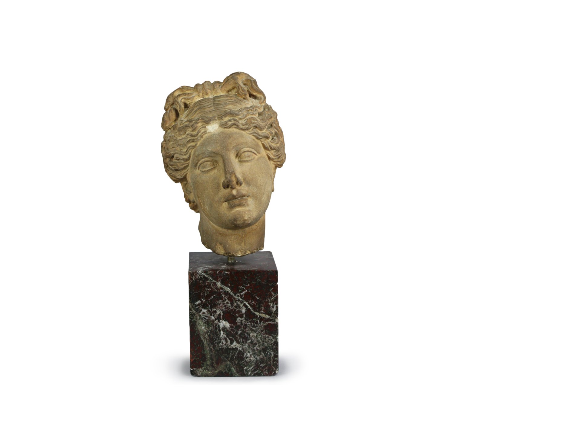 A ROMAN MARBLE HEAD OF A GODDESS