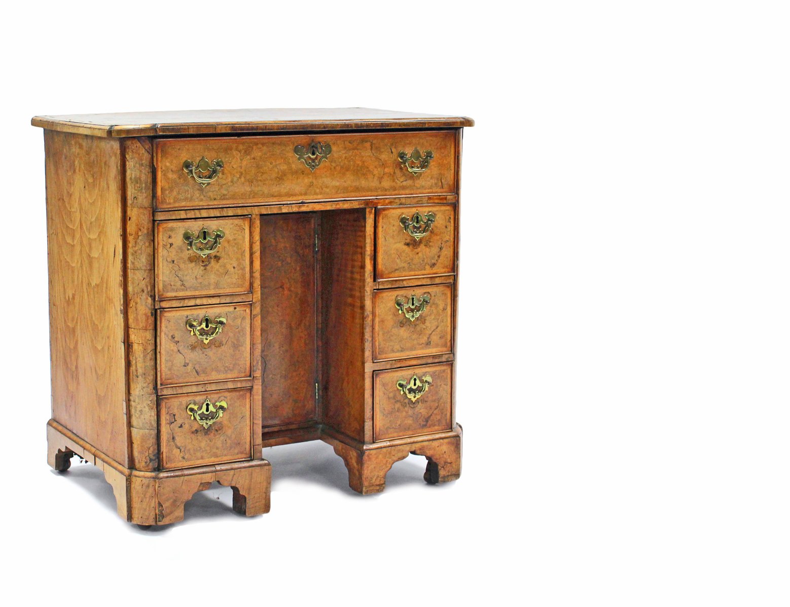 A GEORGE I WALNUT KNEEHOLE DESK