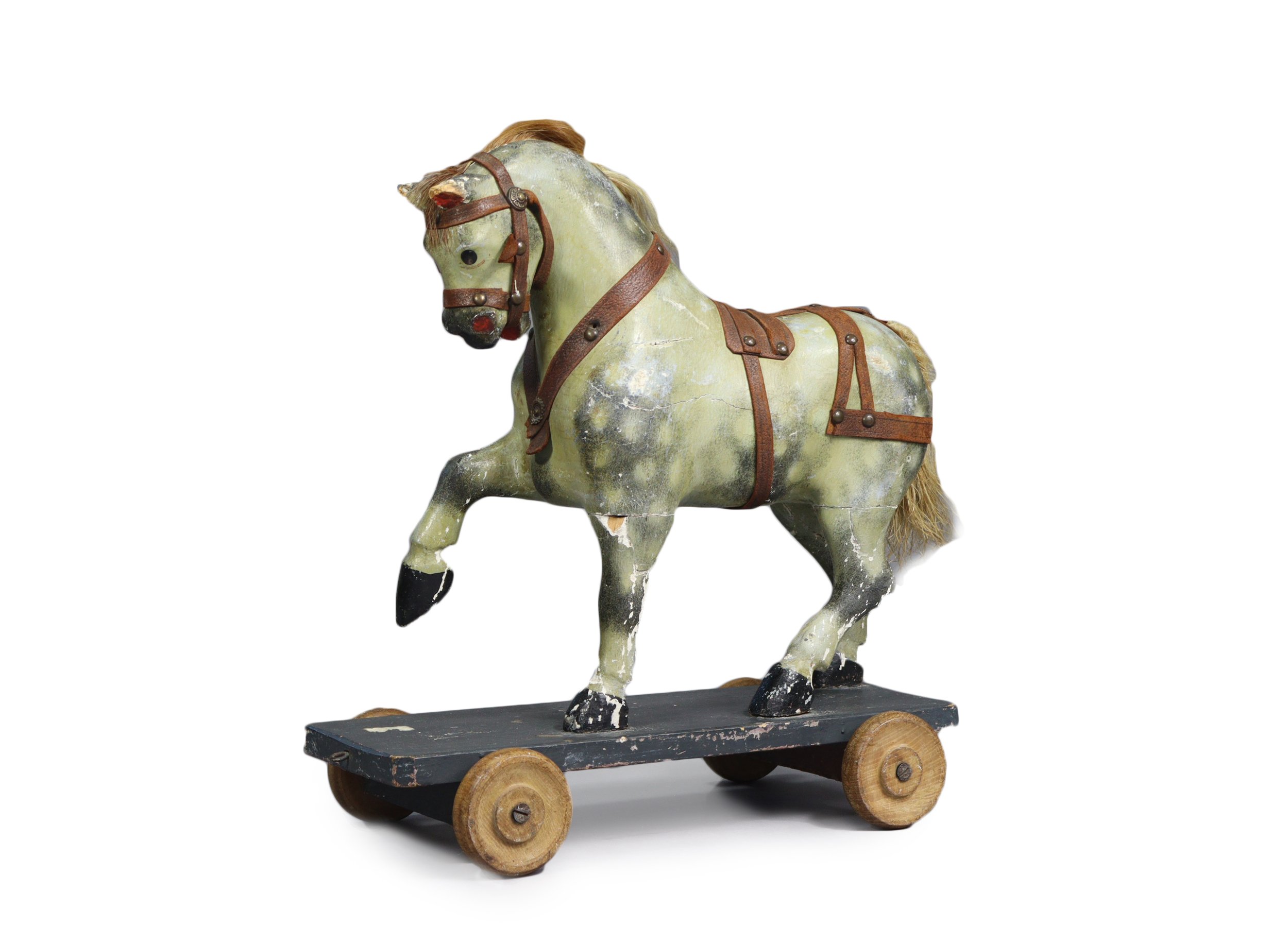 A Victorian pull-along wooden toy horse