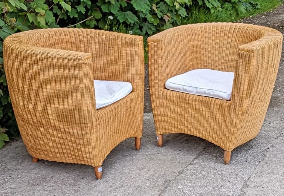 A pair of Heal's tub-shaped wicker conservatory chairs ☀️ 

Lot 17 in next week's Decorative &amp; Household Sale 

Browse and bid online 

.

.

.

.

.

.

.

.

#antiques #interiors #interiordesign #homeinteriors #heals #healsfurniture #conservato