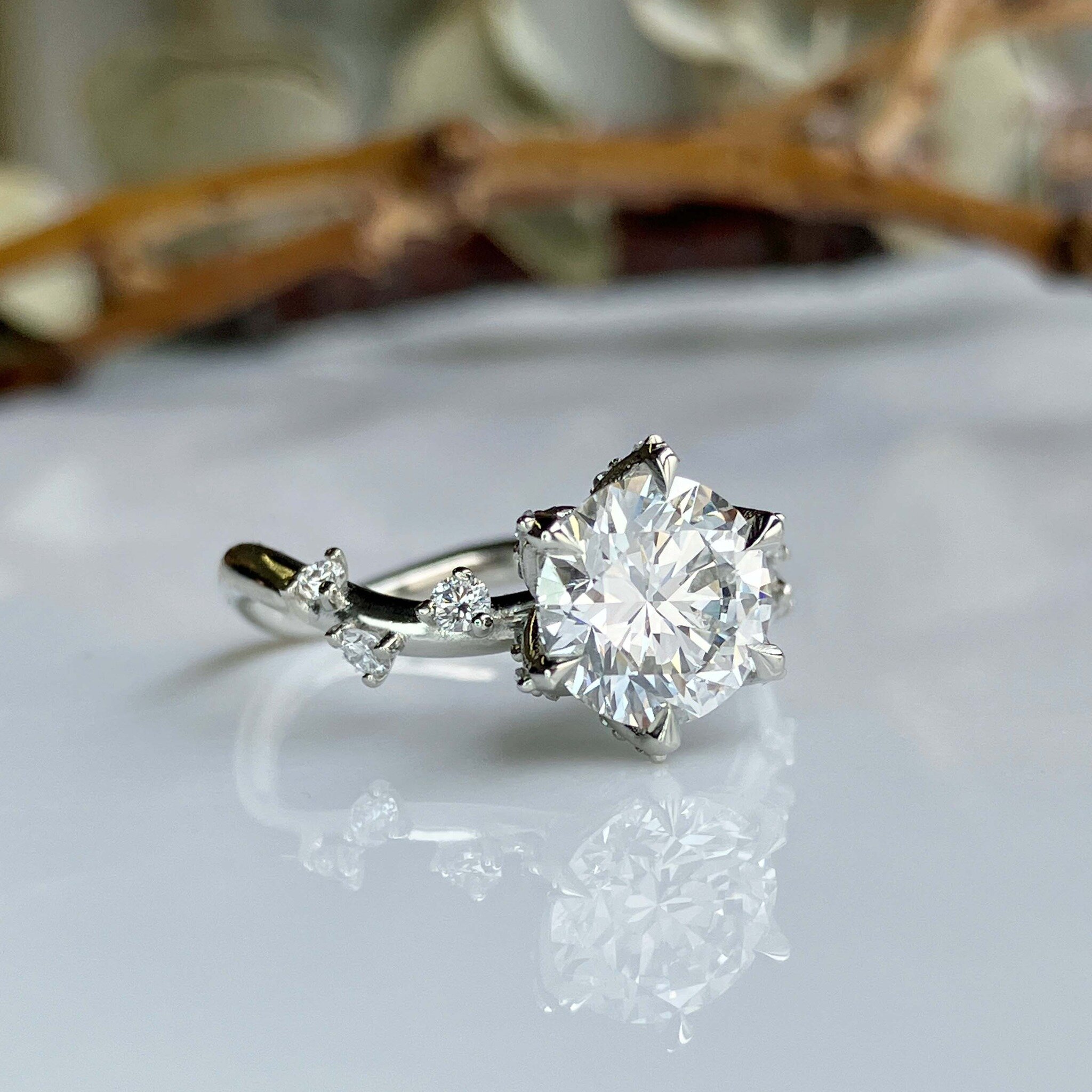 Nature really is the best inspiration. Our client wanted to create a floral and branch inspired custom engagement ring. 
For a view of the diamond encrusted setting take a peak at our story.

Congratulations H &amp; H!

Custom engagement ring, Toront