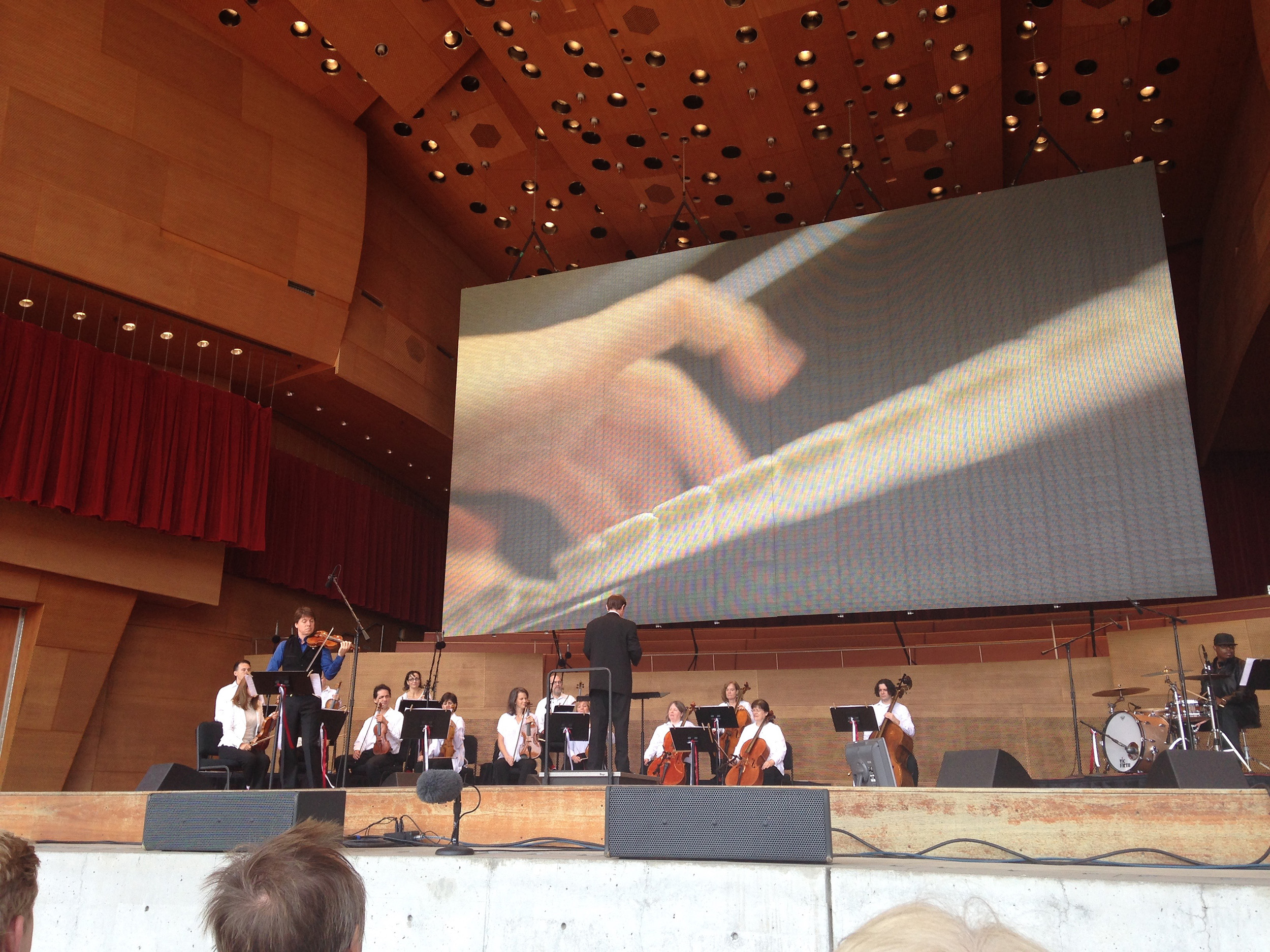 I felt very blessed to be able to come and watch the rehearsal at Millennium Park with Joshua Bell on the left.