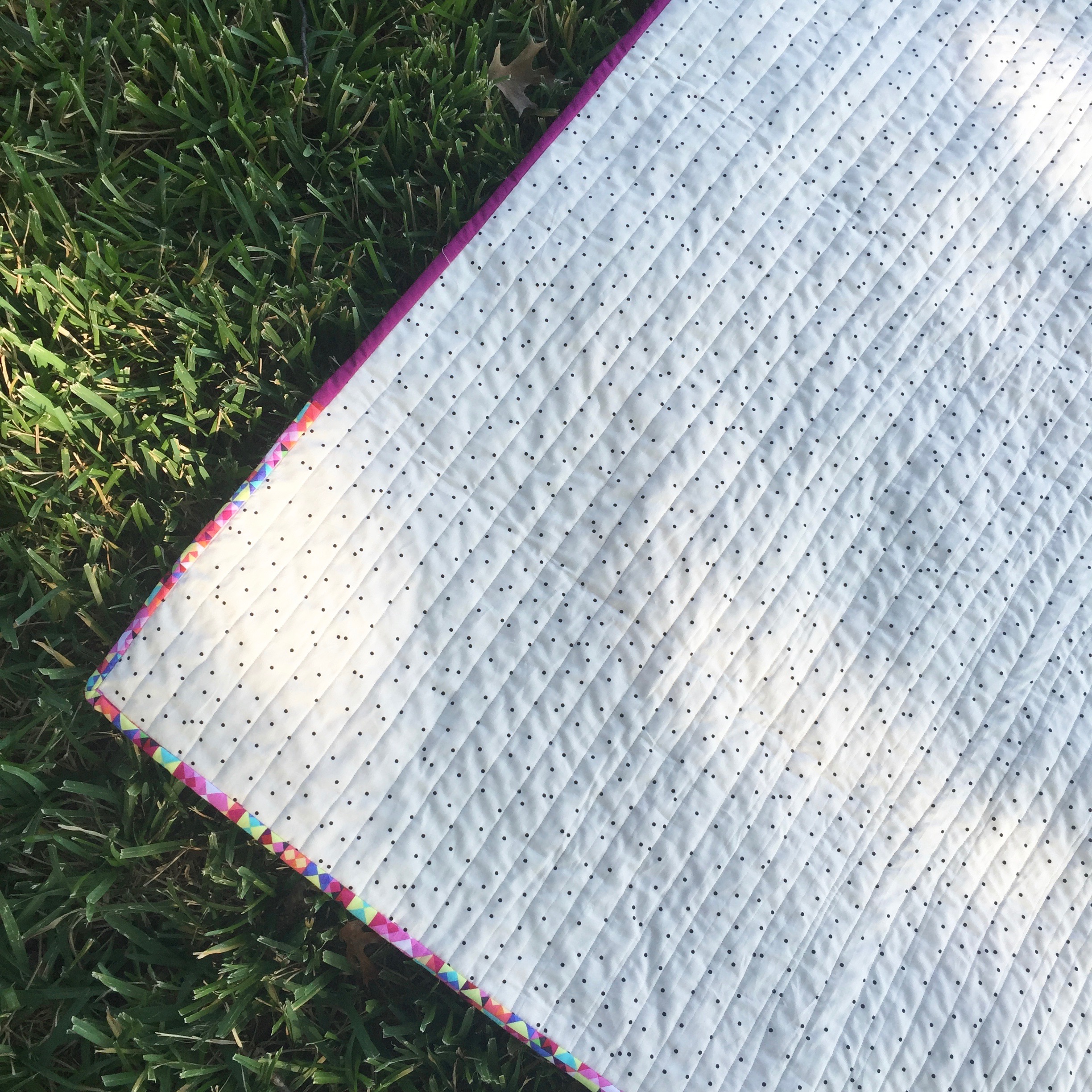 this photo shows exactly where I started using the masking tape to help me line up my quilting