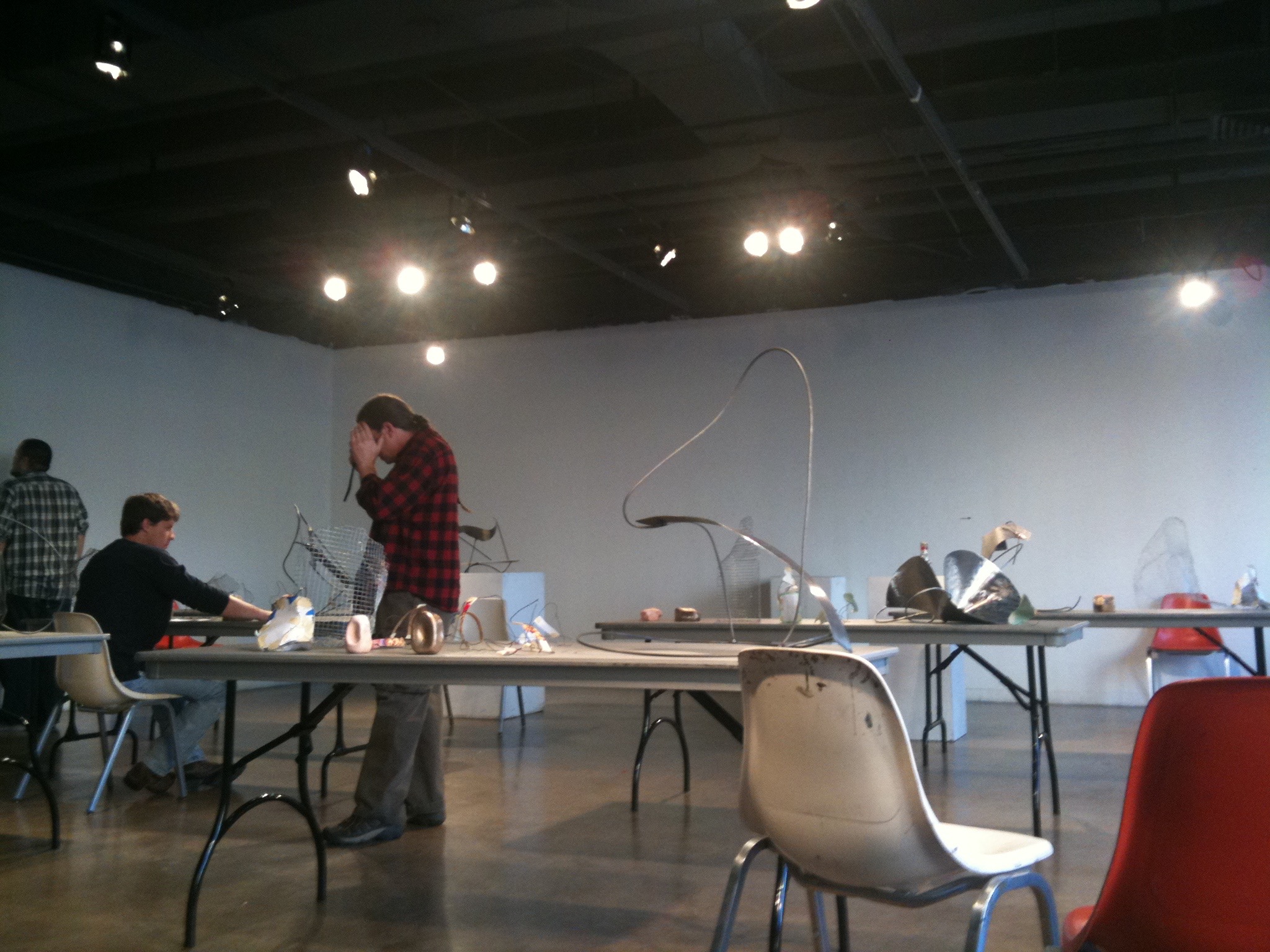 Our final exam critique in sculpture. We had this great gallery that we used for all of our final critiques. You can see my various sculptures on the front table in this photo.