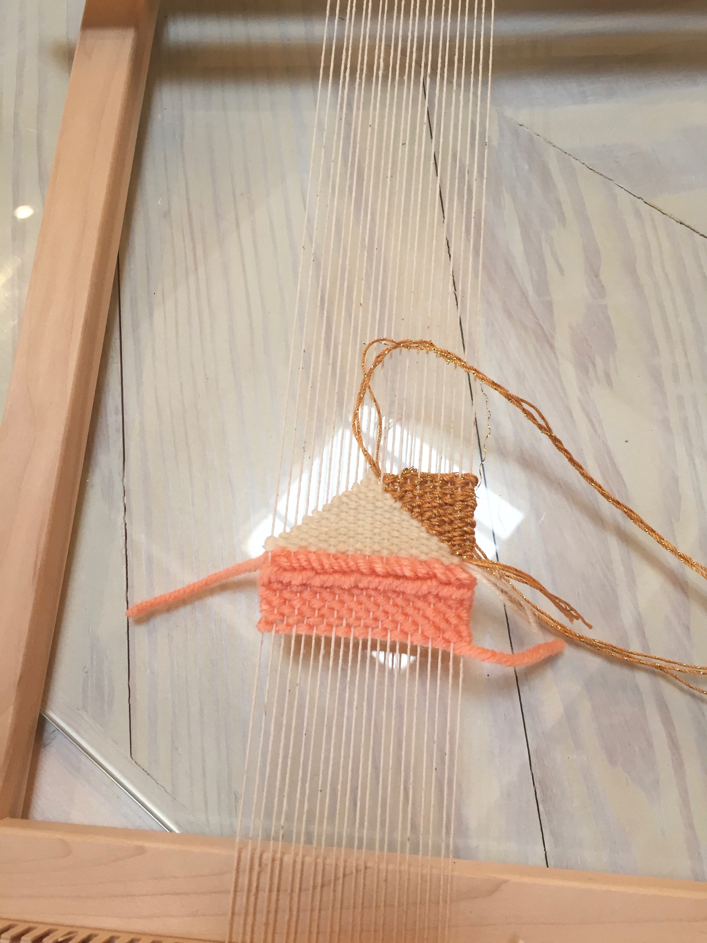 Filling in the sides with a festive gold yarn. 