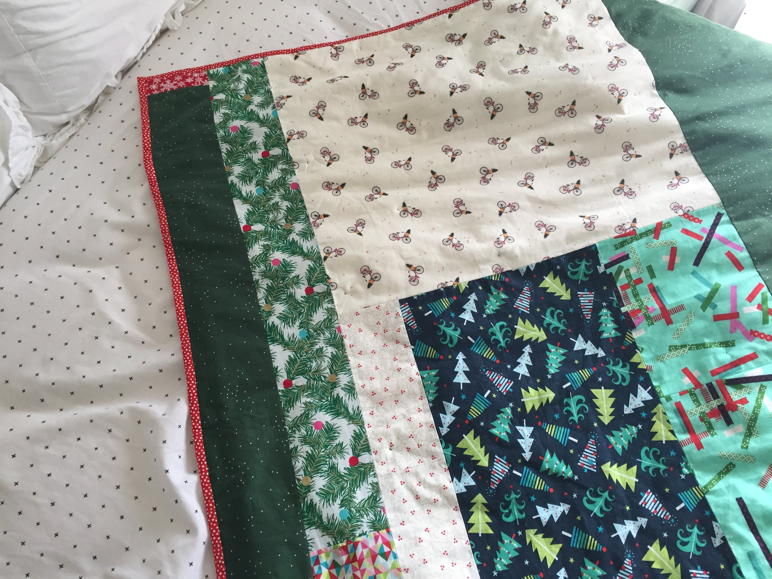 I only bought ONE FAT QUARTER of that Dear Stella Christmas bikes print and I'm so glad I could use it for the back! 
