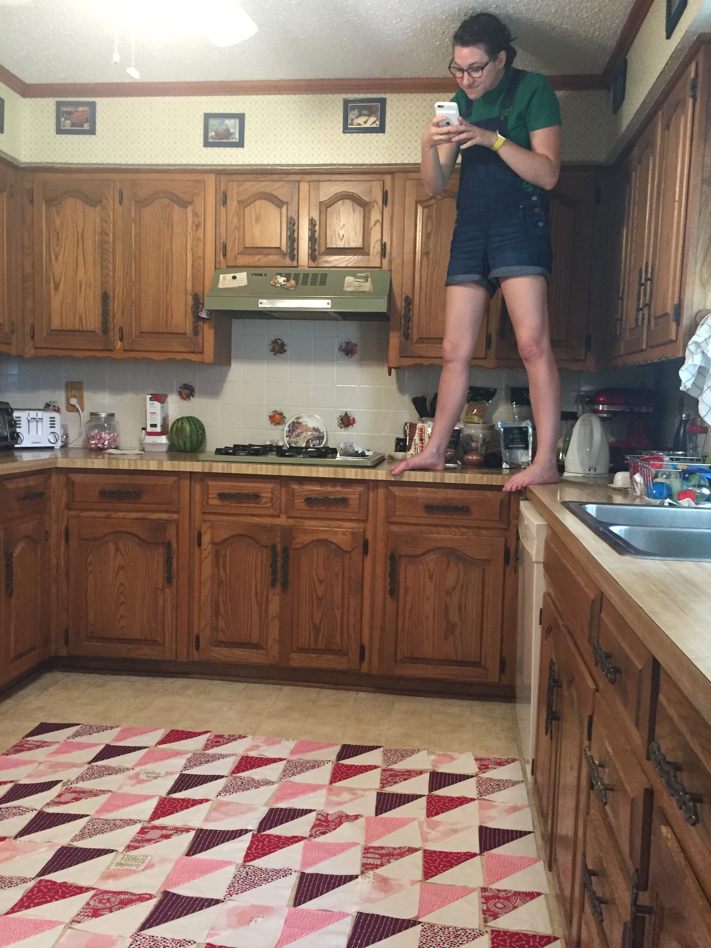 Every quilter has taken pics from above to see how the colors look from a distance. It's just a part of the quilting process. My sister had to stand on the counter to properly look at hers! #beentheredonethat