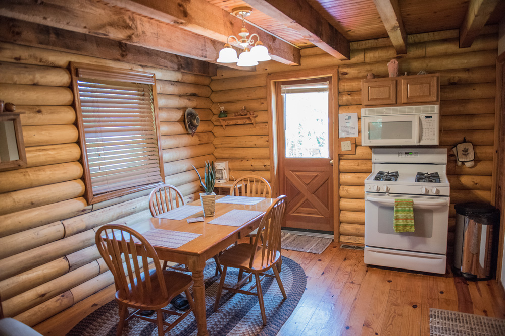 Interior dining area of our log cabin in Indiana.