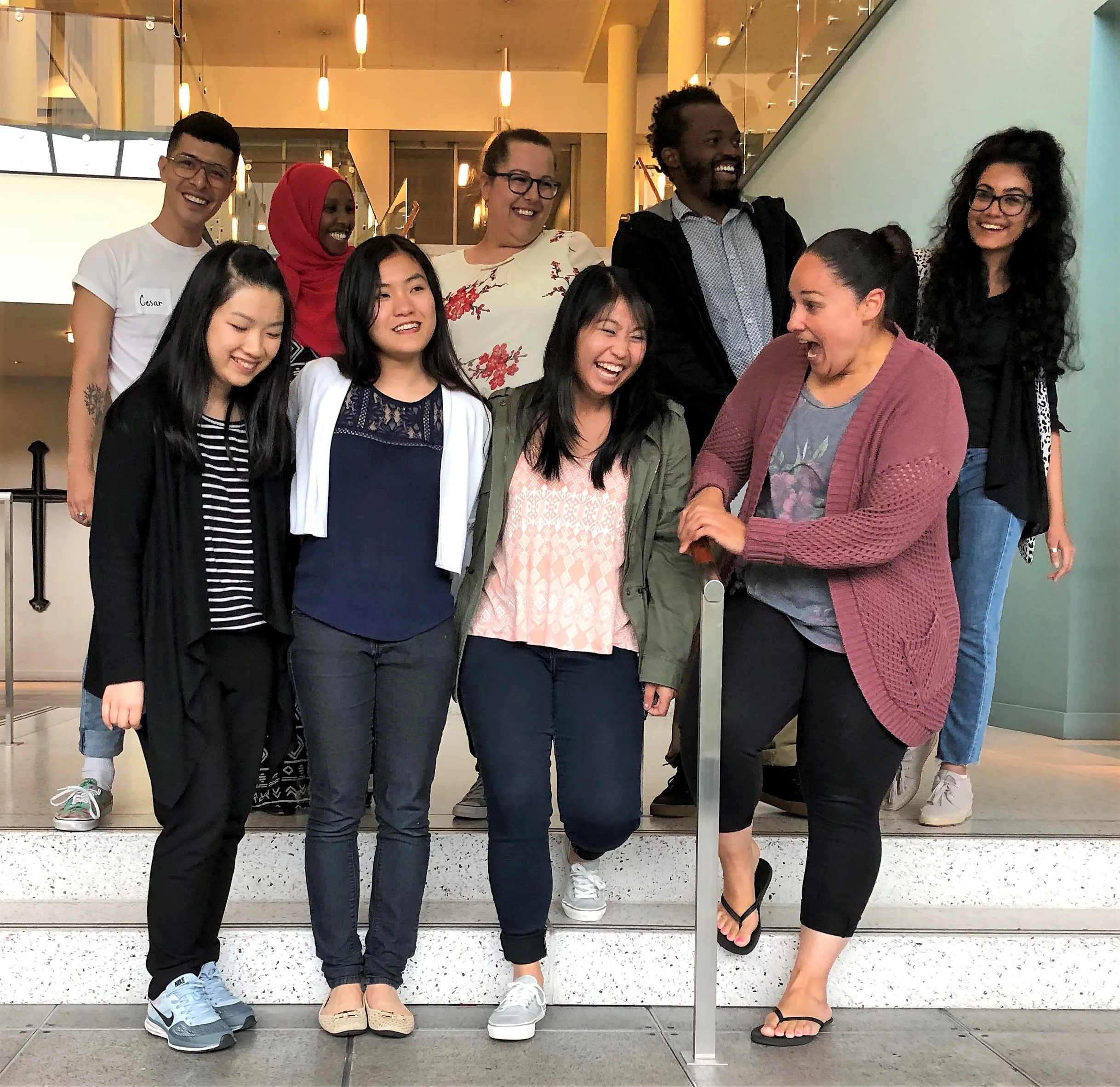Front row, left to right: Yue Zhang, Ngan “Meghan” Nguyen, Chloe Zabrek, Stephanie Sanchez. Back row, left to right: Cesar Rios III, Farhia “Dekha” Hassan, Jasmina “Mina” Omerovic, Michel Mugisha, Chhavi Mehra