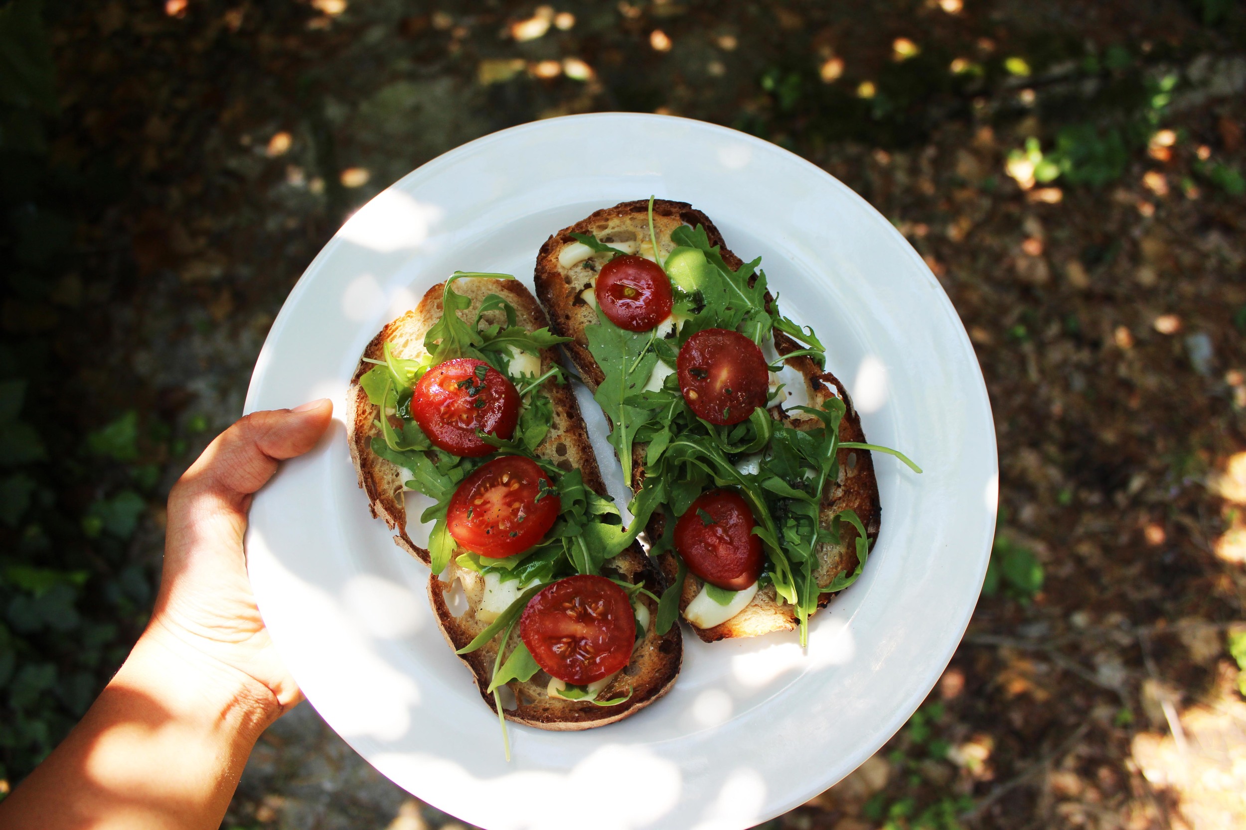 Tomato Arugula Crostini