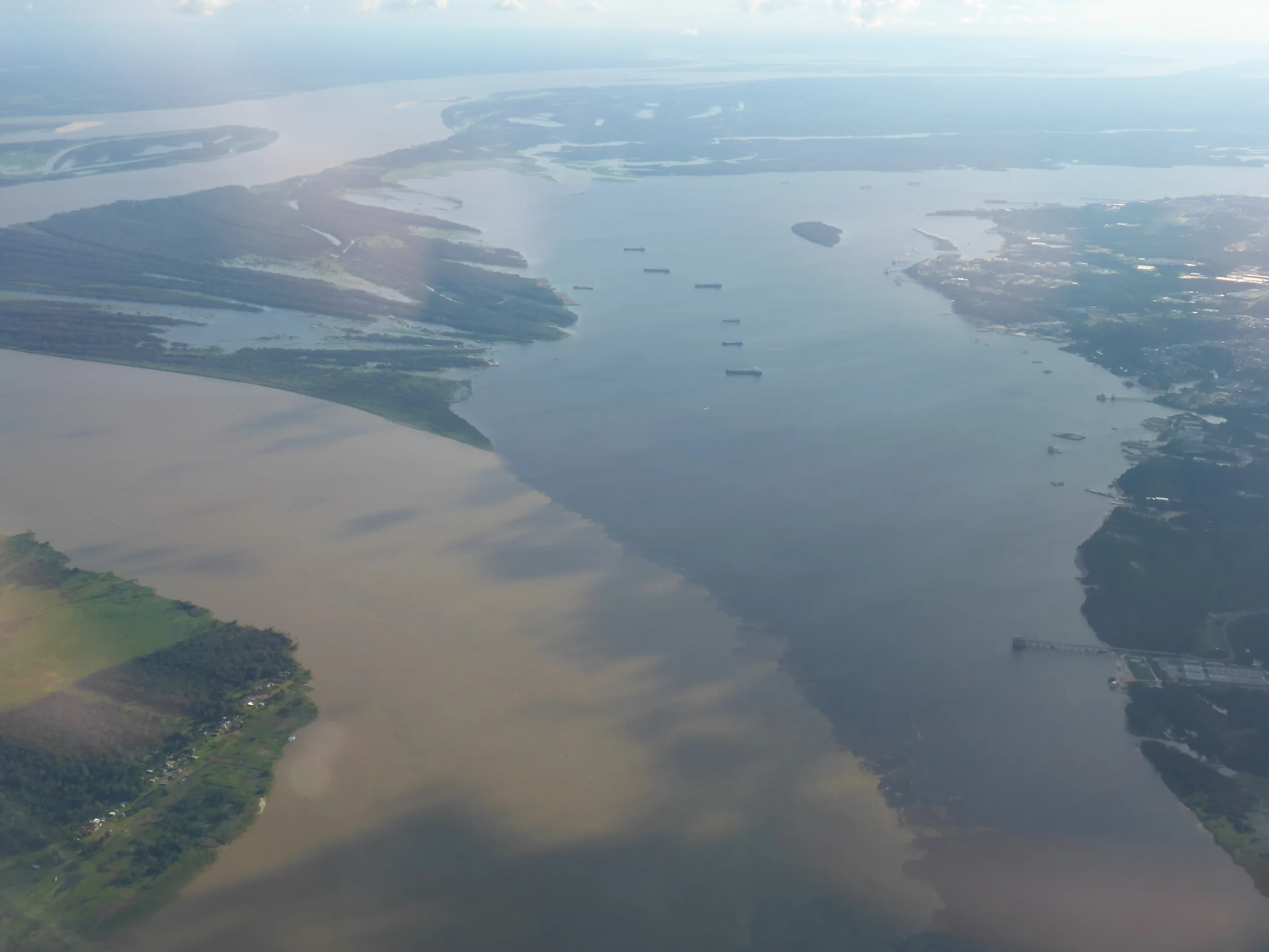 encontro das aguas - 'meeting of waters' where the rio negro and rio solimoes meet near manaus