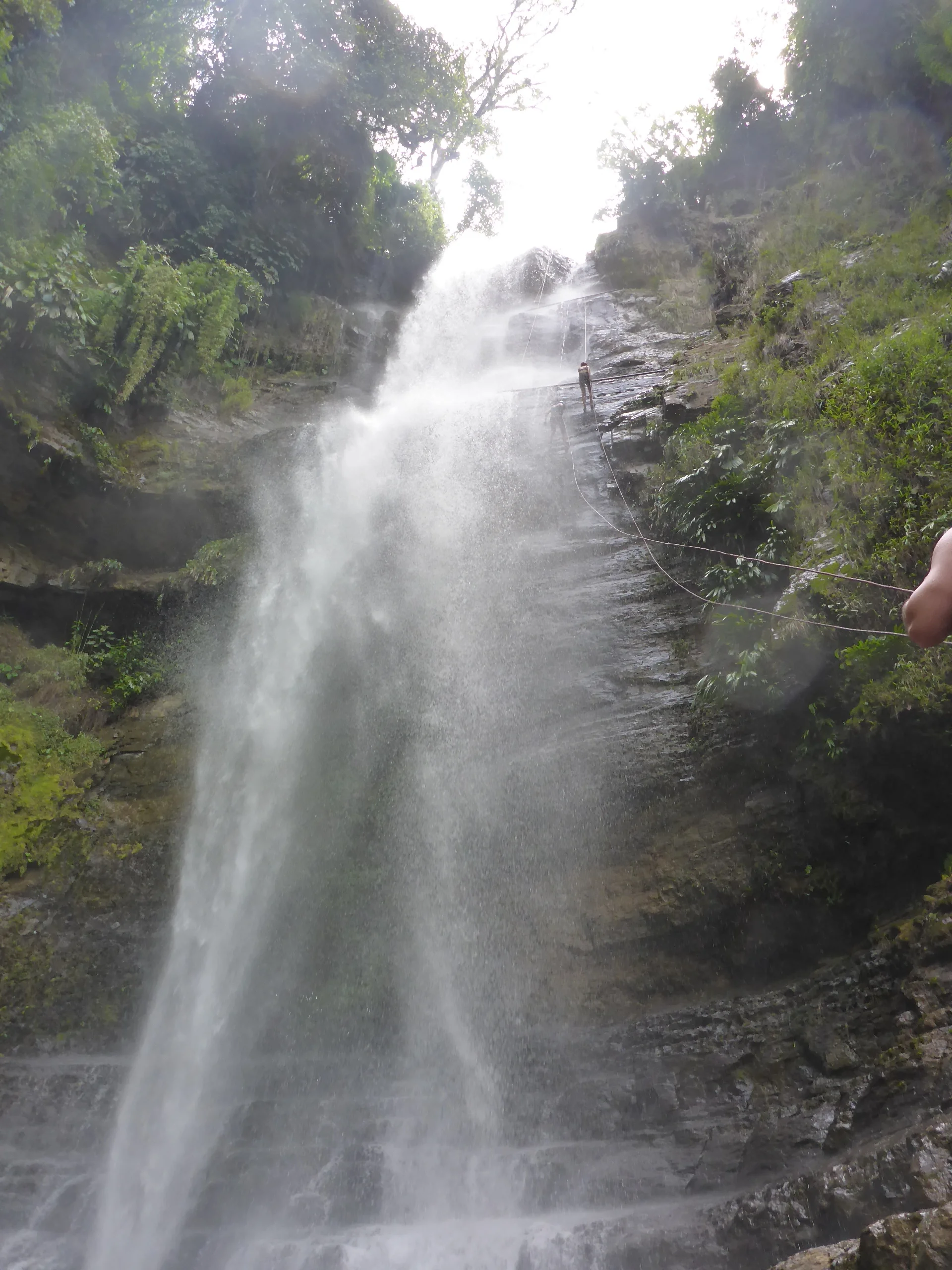 abseilers coming down the falls