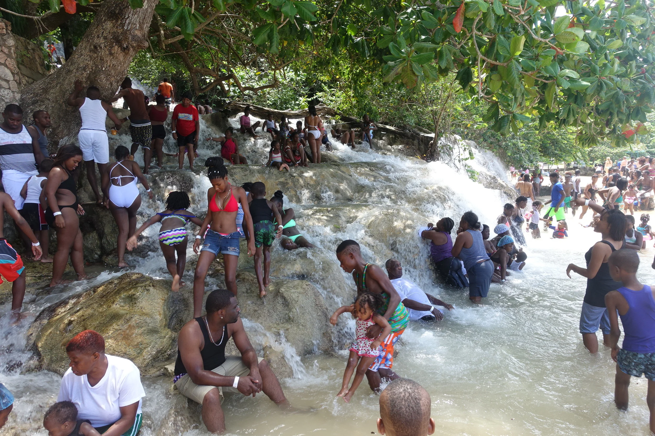 the start of the walk at the base of the falls on the beach