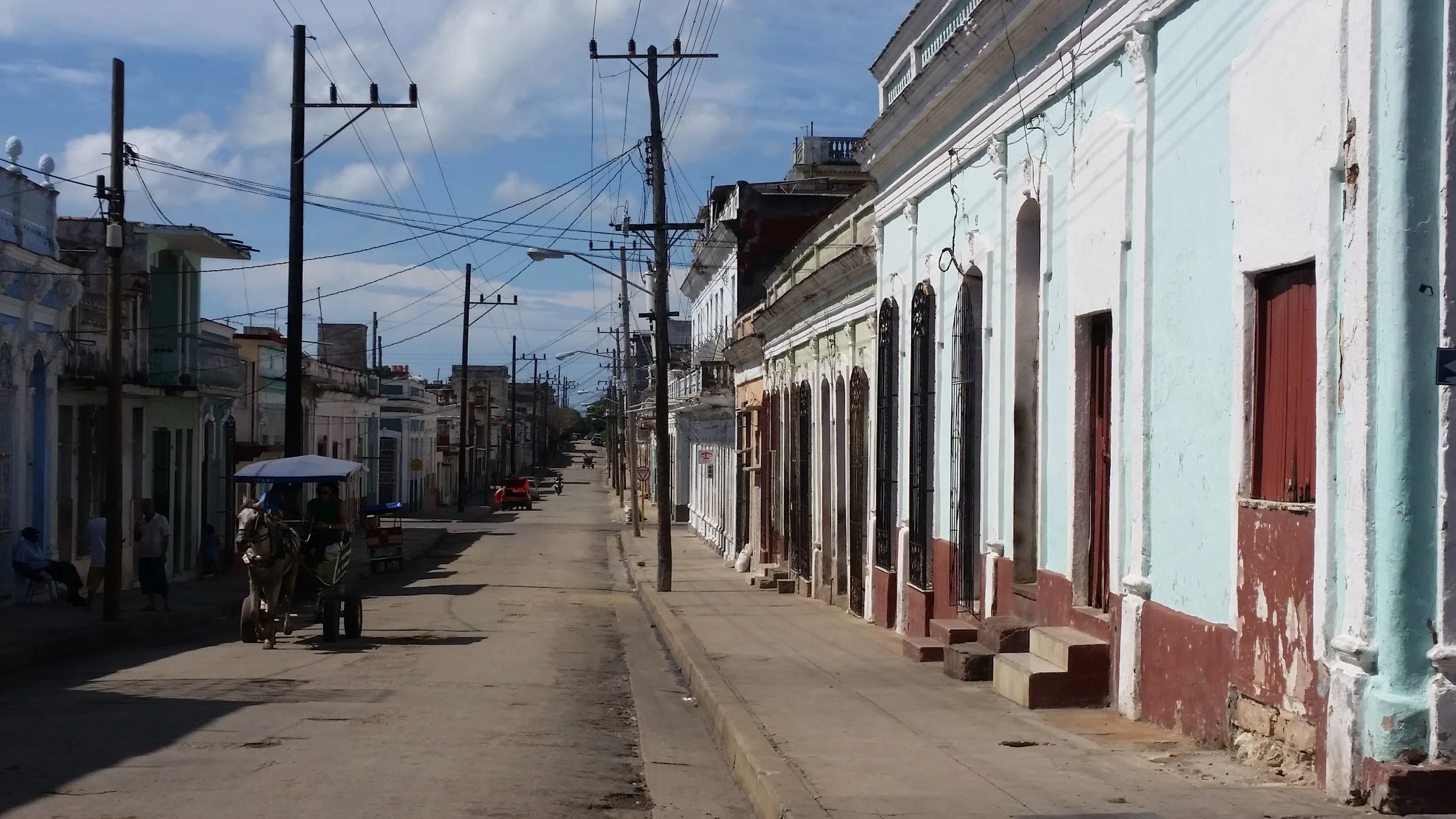 horses and carts work the streets of Cienfuegos as taxis and carting goods
