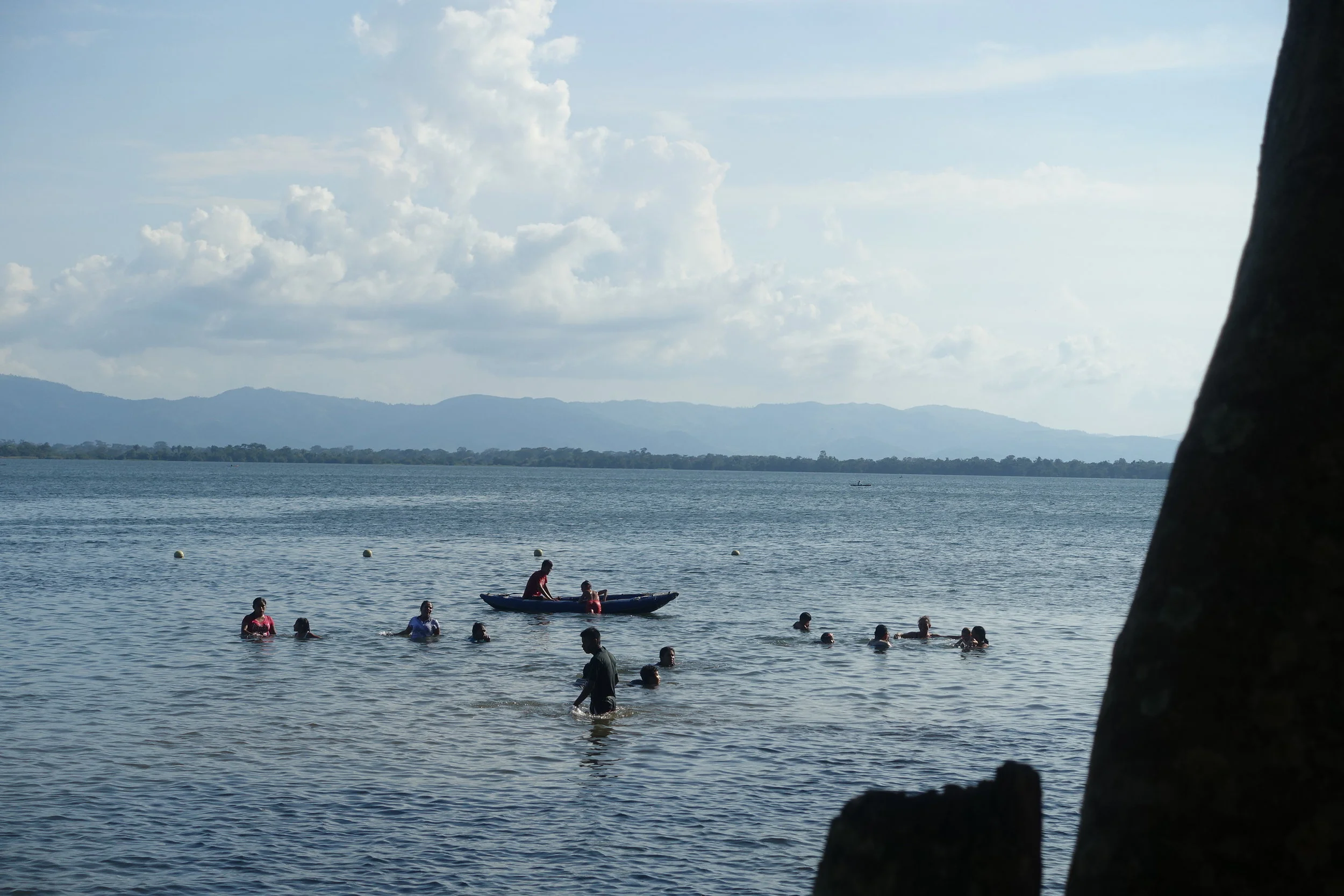 locals cooling off in lake izabal