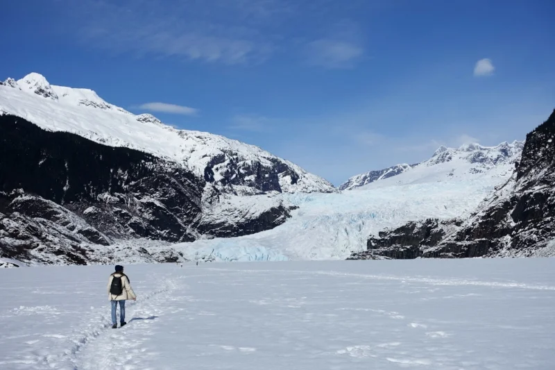 walking across frozen mendenhall lake to the glacier