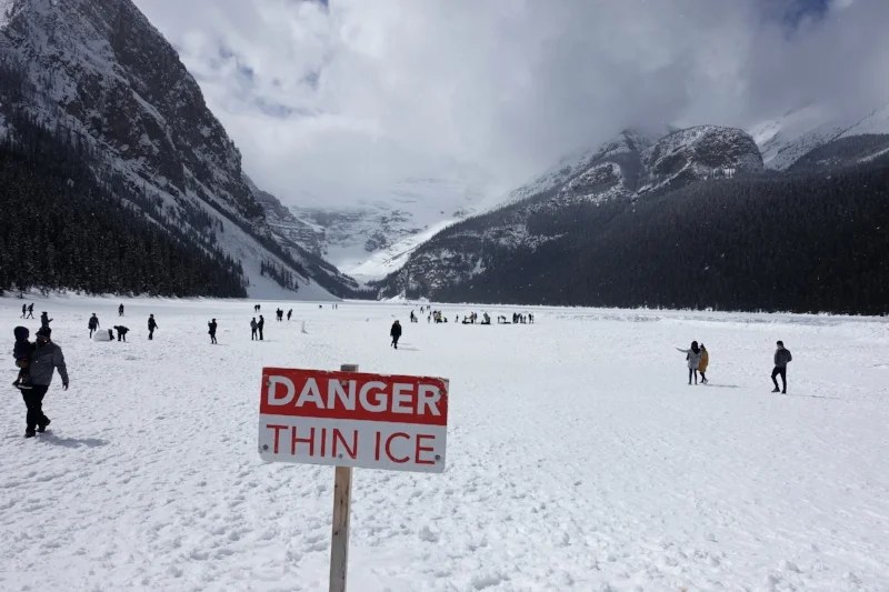 plenty of takers for walking the lake - and ignoring the sign