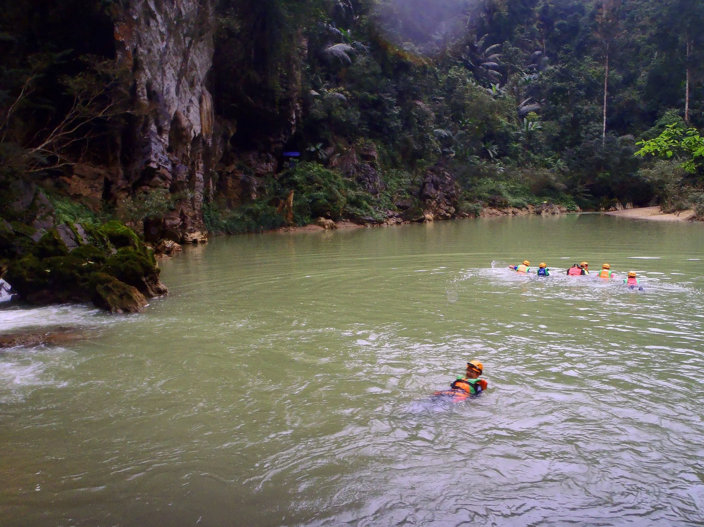 emerging from the cave swim