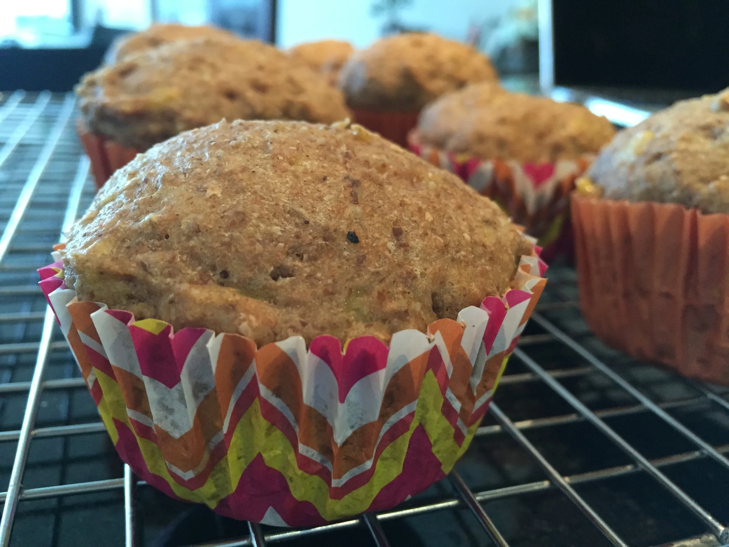 Muffins fresh out of oven without any sprinkles on them