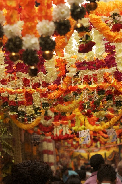  Flower garlands in a Delhi market. Image from Pinterest.