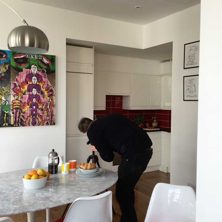 Photographer Chris at work - note the Gilbert and George artwork, I can't decide whether I like it or not!!