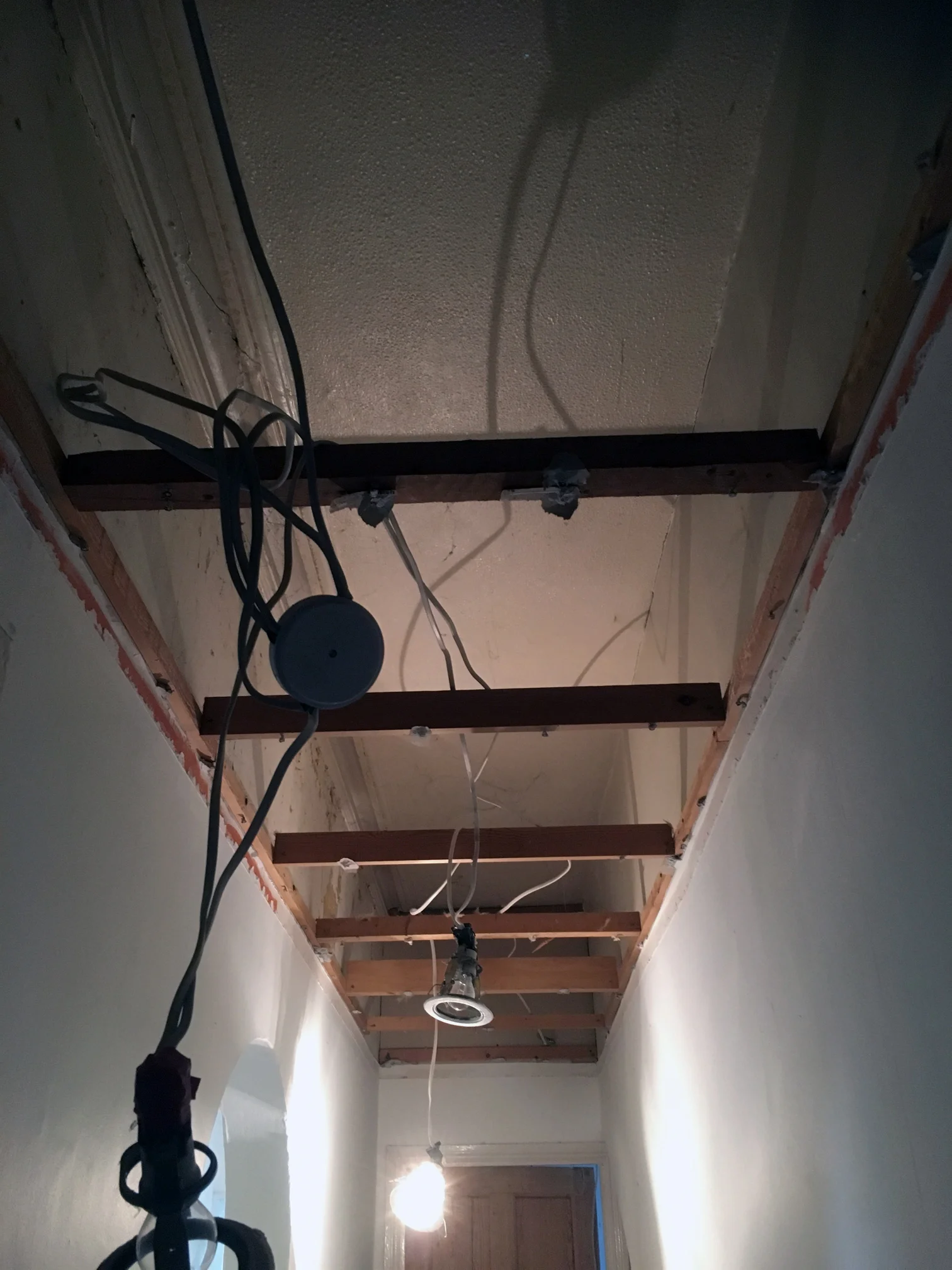 Removing the false ceiling in the hall means I have gained almost two feet in height!