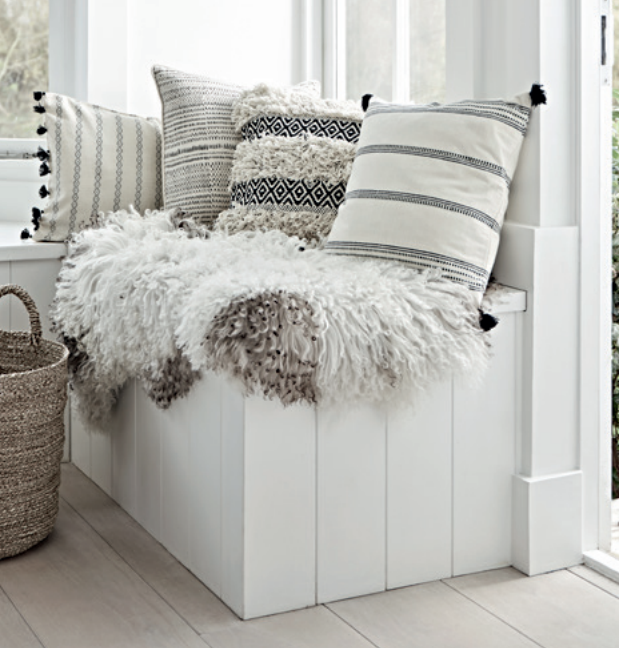 Cushions L-R: Maya tassled cushion £45, Dash piped cushion £45, Fora tufted cushion £30, Ilda striped cushion £35.