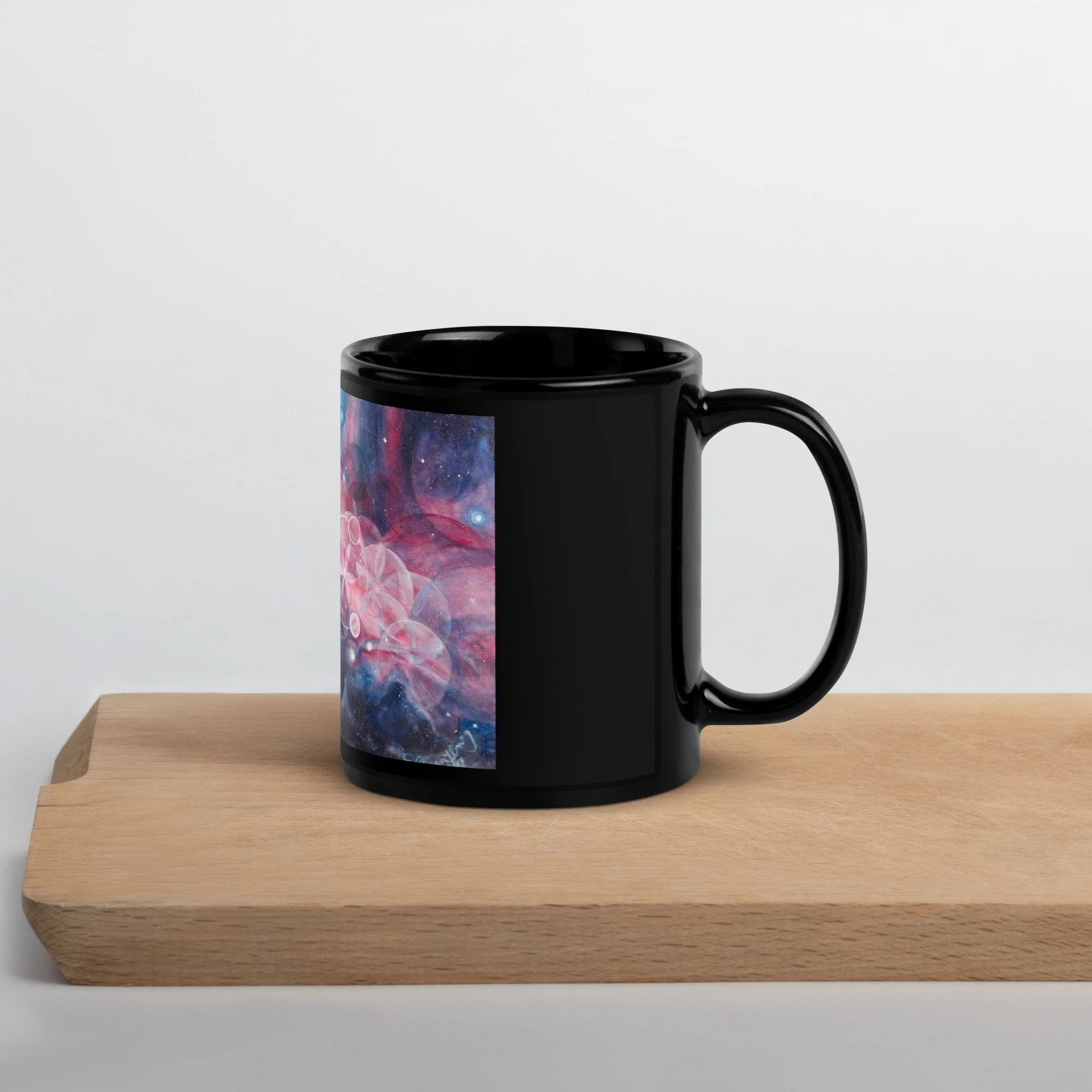 black-glossy-mug-black-11oz-handle-on-right-635d440688c5f.jpg